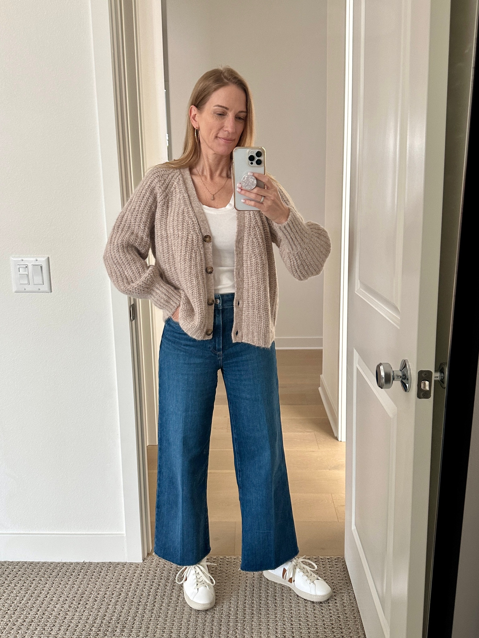 Comfy casual! Loving these wide leg, high waisted Paige jeans with a little stretch. And the coziest Sezane cardigan for cooler weather. Paired with my favorite Veja white sneakers it makes for one perfect weekend outfit! 

#LTKShoeCrush #LTKOver40