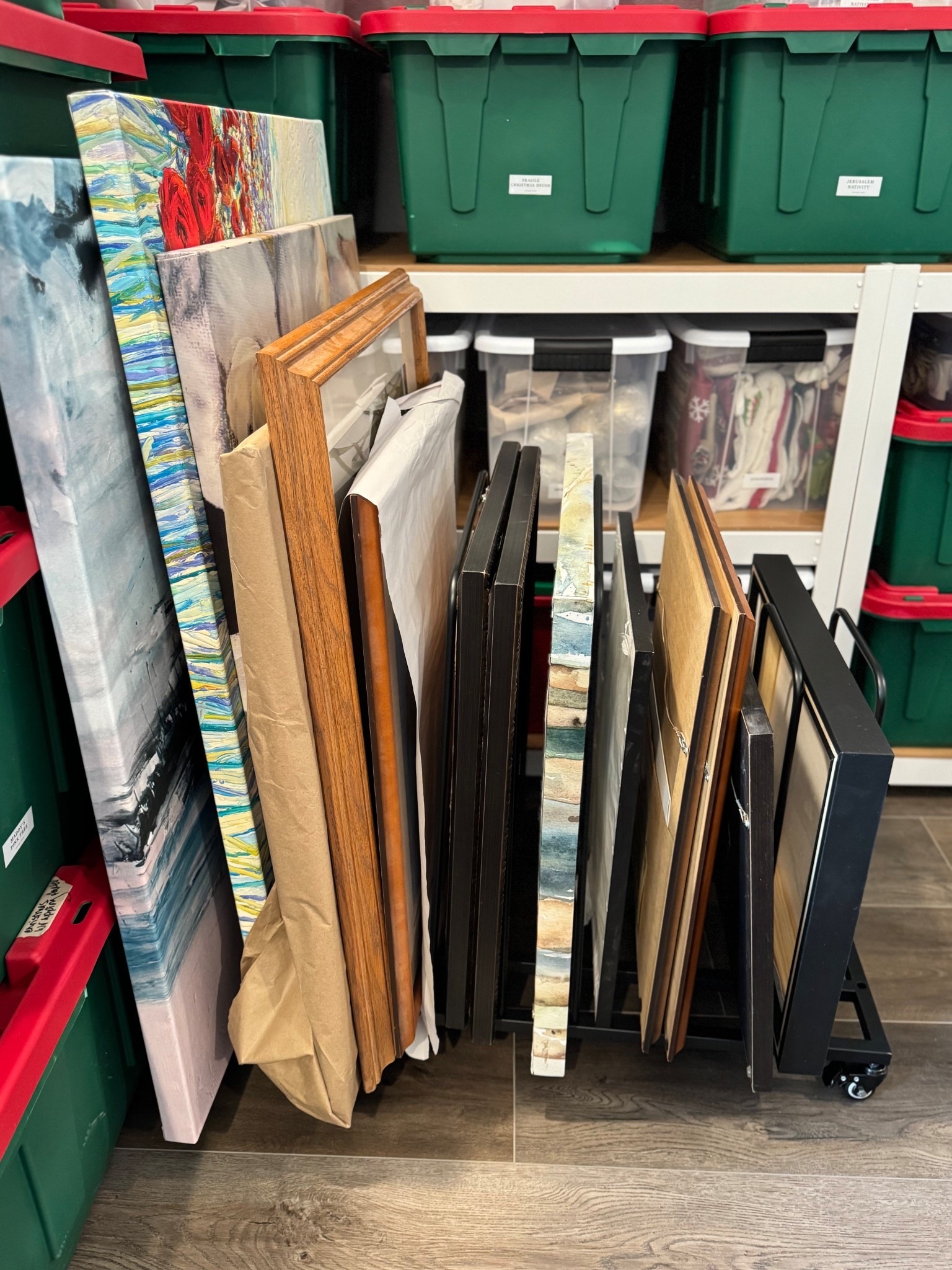 Art/canvas/picture frame storing rack! On wheels and keeps everything lined up! Easy to move in and out of your storage room! We use these in clients homes often!

#LTKHome