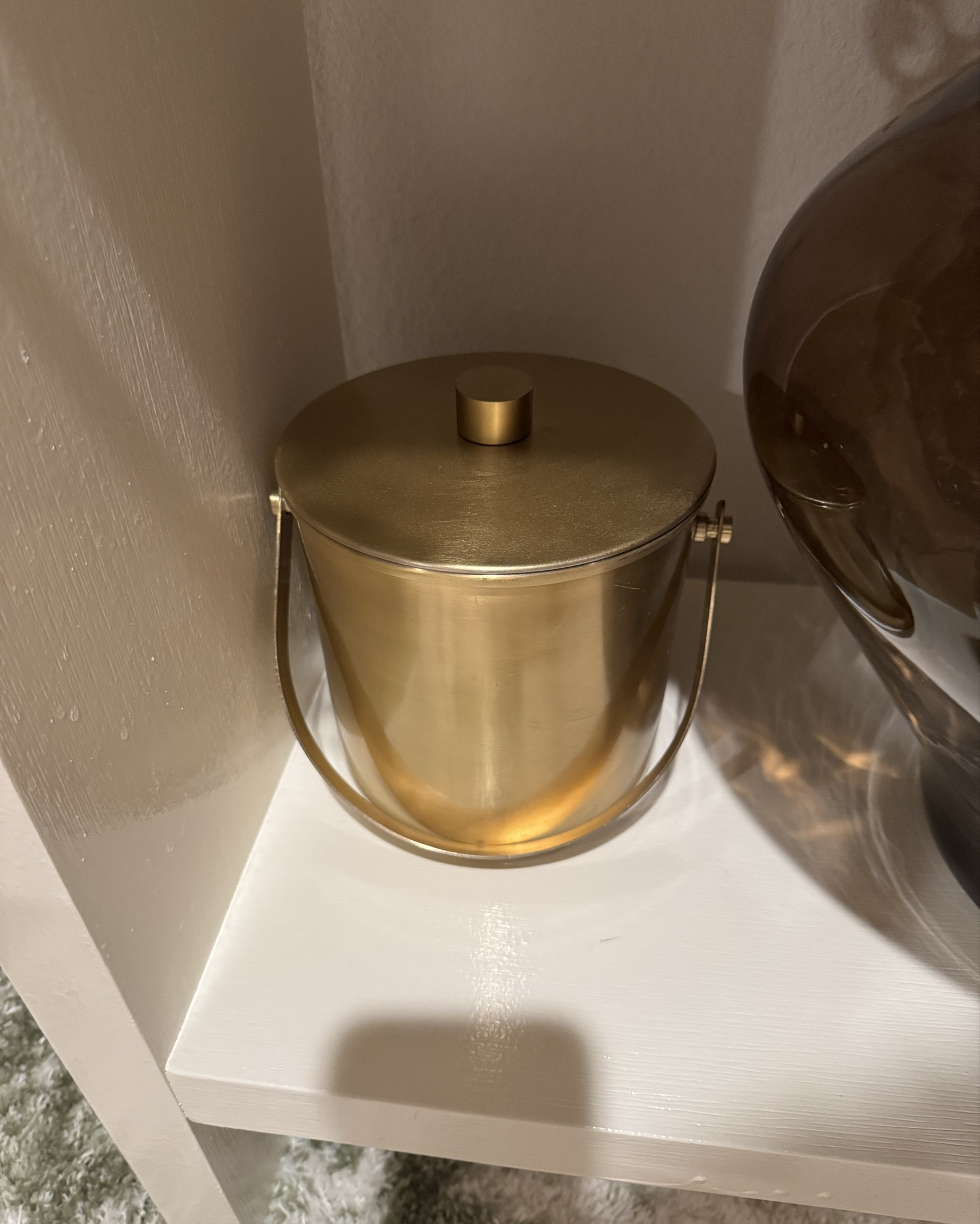 Gold insulated ice bucket — not the exact one I own, but this is the closest match in look + function. Keeps ice cold, looks elevated, and finishes the bar setup without feeling extra.

#LTKFindsUnder50 #LTKHome