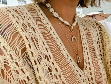 Vacation accessories. Miami vacation inspo. Crochet boho beach cover up. Crochet swim cover. 3 stack gold shell beachy bogo necklaces. 

#LTKswim #LTKunder50 #LTKSeasonal
