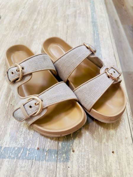 The most adorable and comfortable double-buckle slide sandals (Birkenstock dupes!) - 50% off right now and under $55. 

Emma wears these all the time paired with dresses, shorts, rompers, jeans… they go with everything! 🌸✨🤍 

Perfect summer shoe. 

#LTKshoecrush #LTKfindsunder100 #LTKtravel