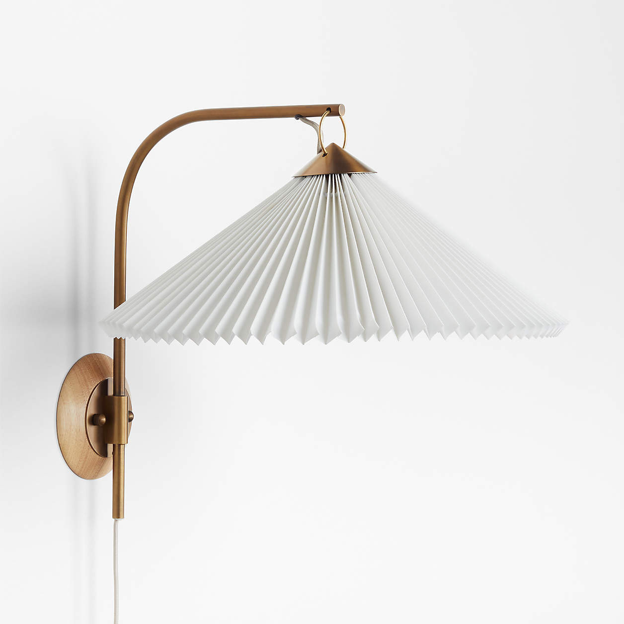 Flores Plug-In Wall Sconce Light with Pleated Shade + Reviews | Crate & Barrel | Crate & Barrel