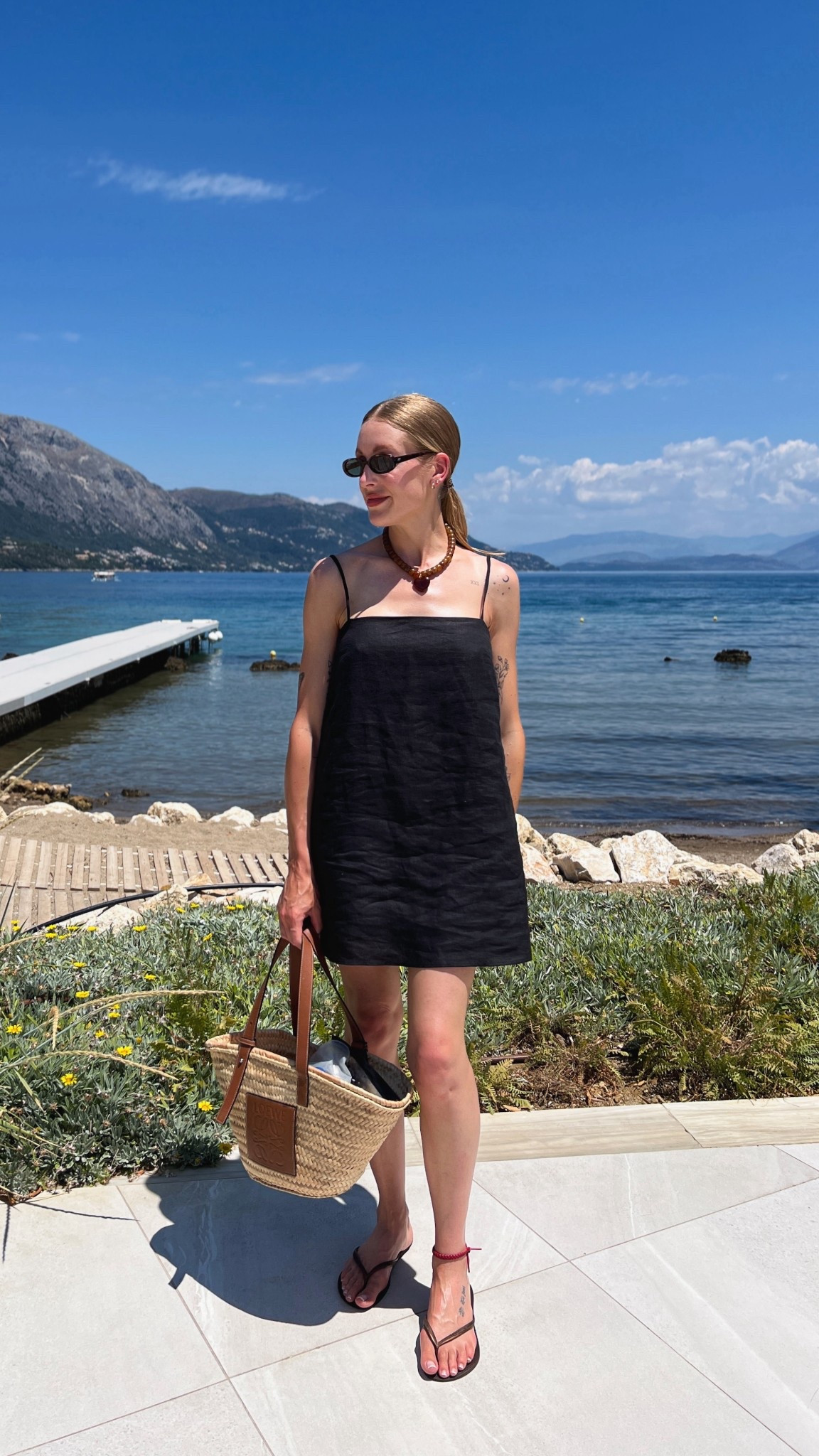 Holiday outfit Corfu 

Sezane black linen dress - summer dress - heart bead necklace - Loewe straw basket bag - European summer outfits 



#LTKtravel #LTKsummer #LTKuk