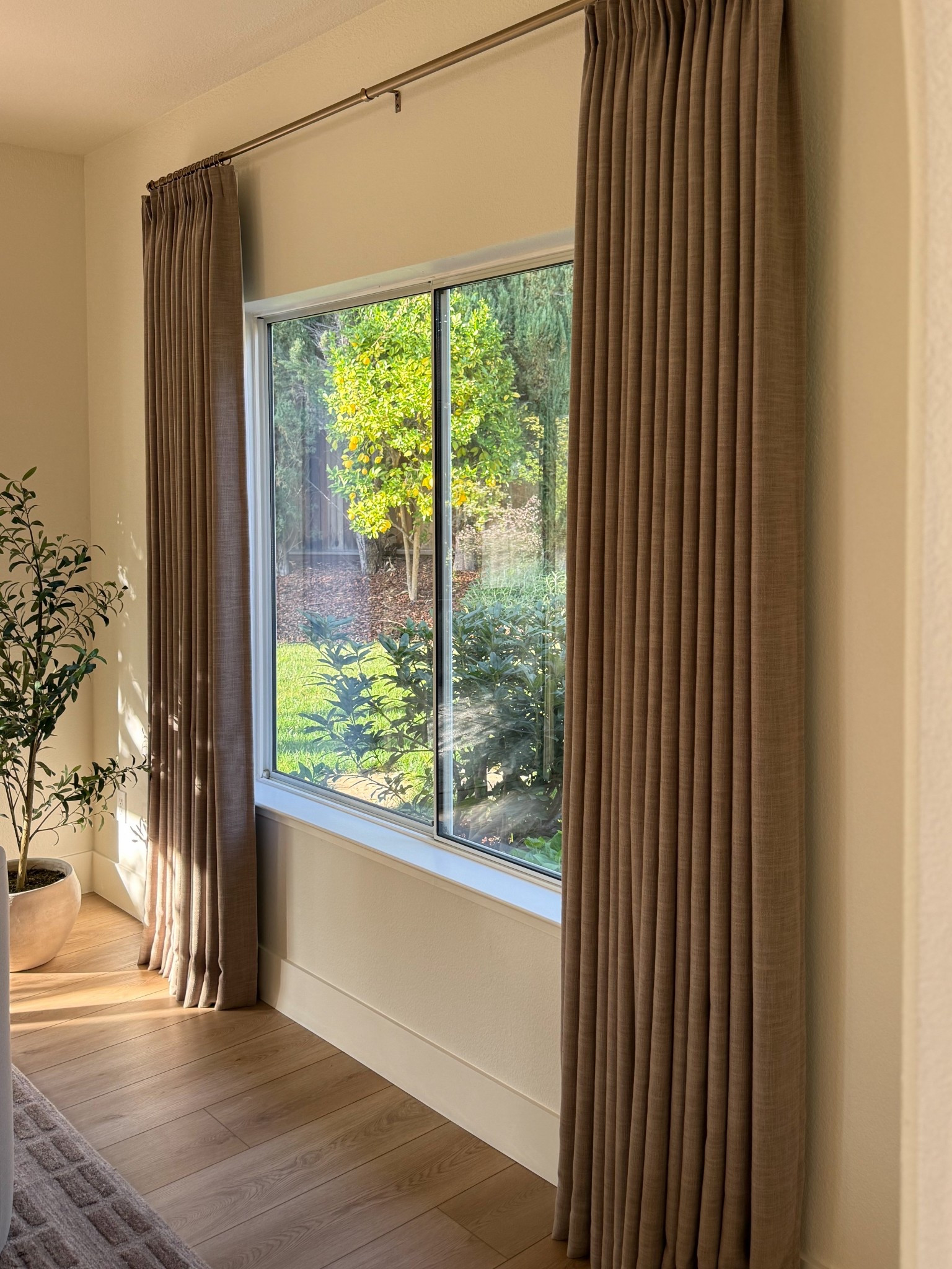 My favorite curtains: Two Pages Liz Linen collection. Use code PAULABHOME for 24% off your Two Pages order  

Details: 
Liz Linen color Taupe Grey 1908-8
Taylor Pleat, memory shape
Privacy lining

Amazon rod and rings. 
Flooring: Provenza LVP Moda Living color Roadtrip  

#LTKU #LTKSeasonal #LTKHome