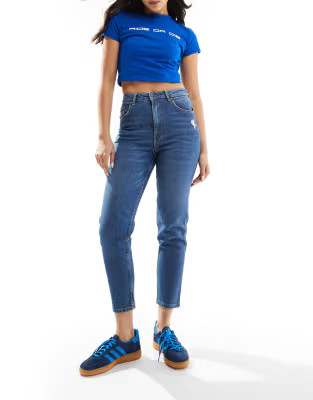 Bershka comfort fit mom jean in mid blue | ASOS (Global)