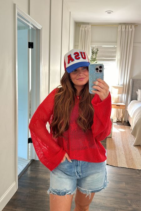 Loving this open knit star sweater! Super cute thrown over a swimsuit like this or with a pair of shorts!!! Had to add the USA trucker hat to make it a little more festive for Memorial Day Weekend!! 

Code: BrittH20 gets 20% off! 

Wearing size medium in sweater, swimsuit & shorts 

#MemorialDay #FourthofJuly #patrioticoutfit #truckerhat #onepieceswimsuit