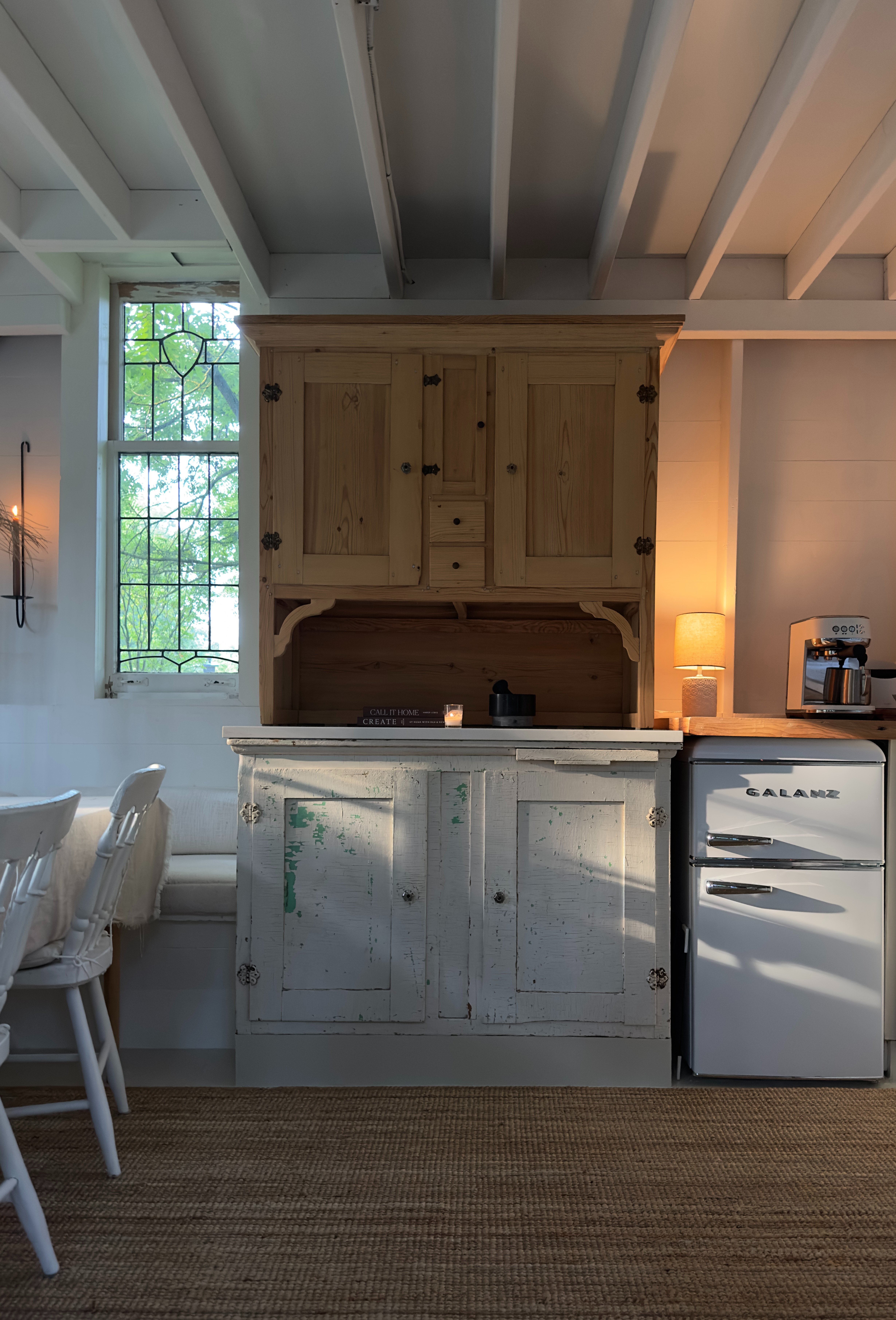 Cabin Life. Candles. Soft light. Great cuppa java ( seriously tho, I love that little Bambino Plus ) It was an investment, but I have no regrets. There is an automatic steam wand that makes a perfect latte. The steam wand even self cleans. It does all the things, except vacuum the cabin :)    

 