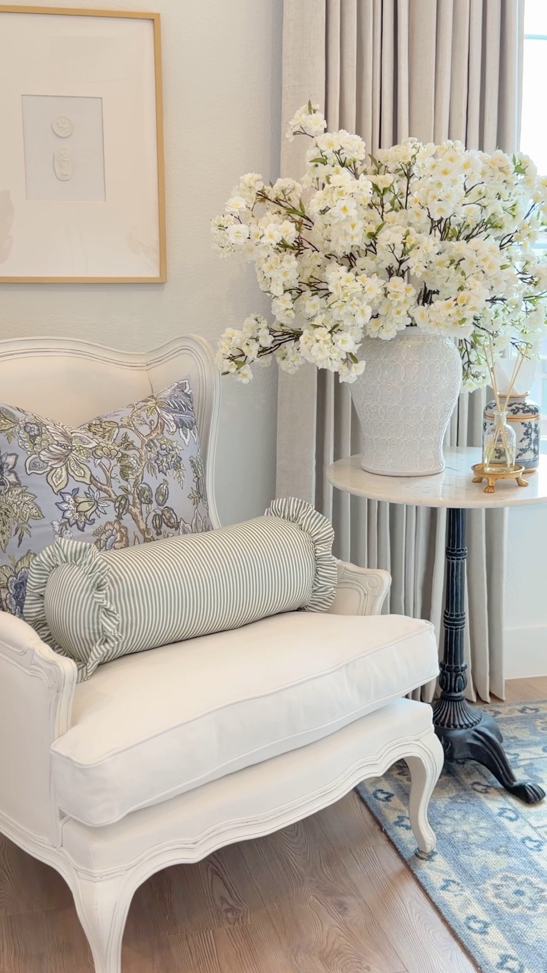 Sitting area styling ✨ traditional home bedroom corner cherry blossoms white French chair spring decor tissue box French decor ginger jars 

#LTKHome #LTKSeasonal #LTKSaleAlert