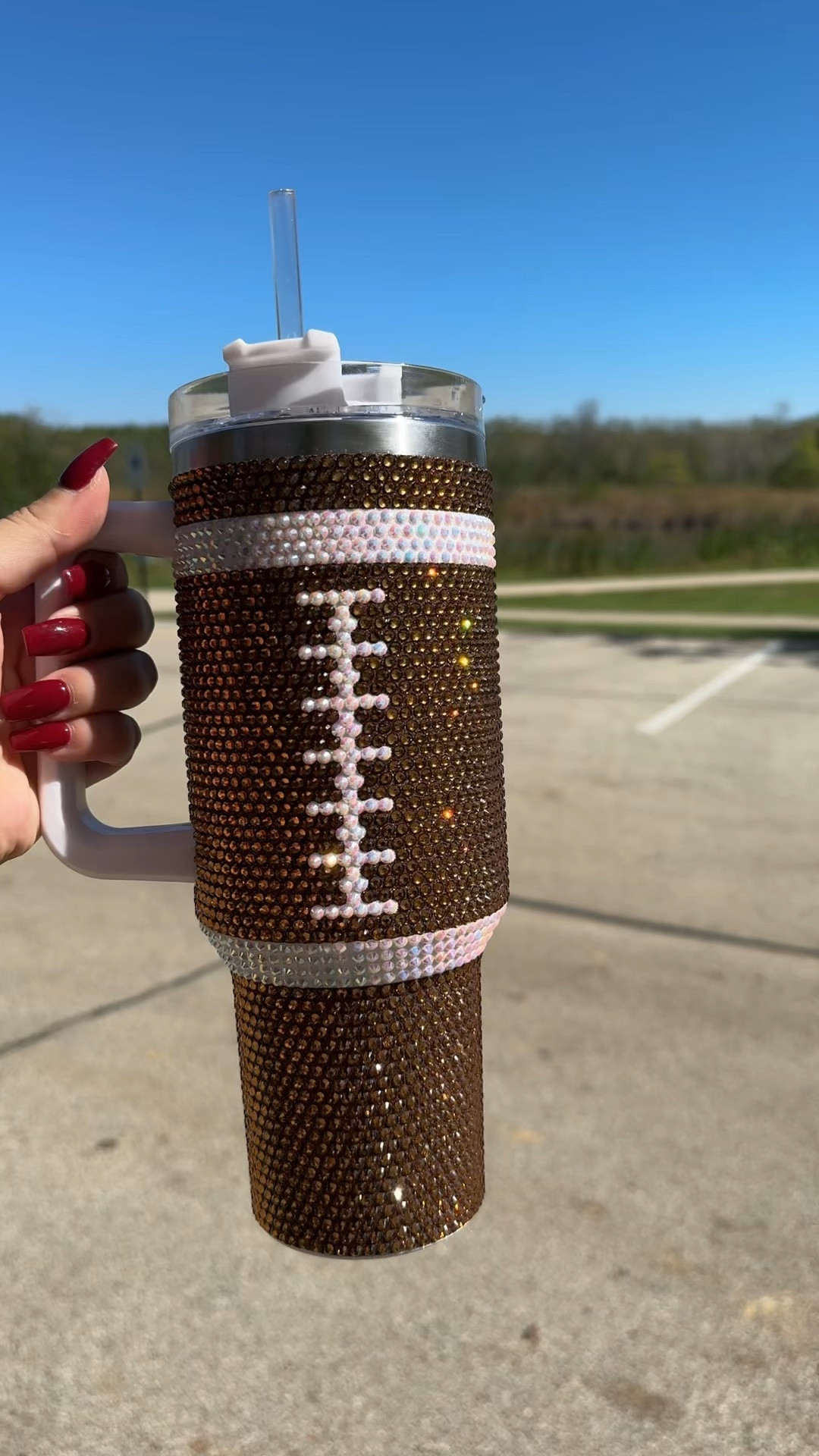 Love my football tumbler cup!!! It’s so sparkly and cute!! And it also comes in a bunch of other colors too! #football #gameday 

#LTKHome #LTKFindsUnder100 #LTKSeasonal