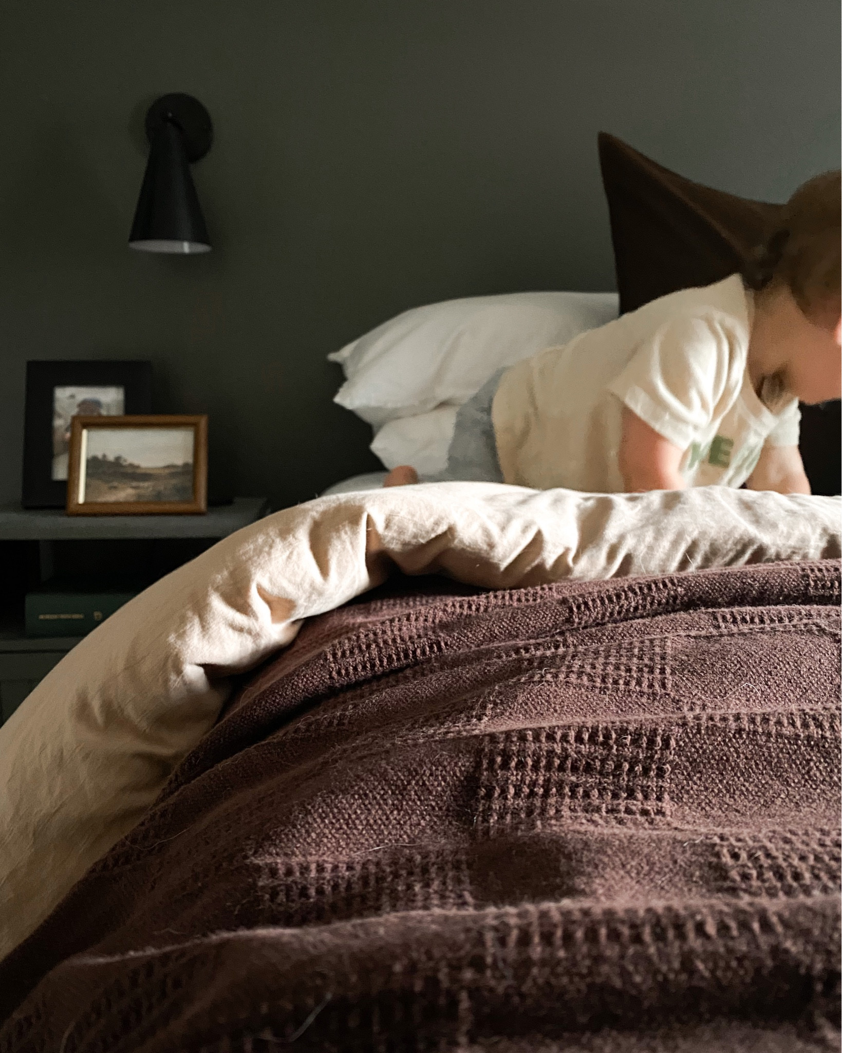 Bedroom progress! Loving the sconces and the dark moody vibes 

Dark bedroom. Green bedroom. Brown bedding. Neutral moody bedroom

Wall color is SW Cast Iron 

#LTKstyletip #LTKhome #LTKfindsunder100