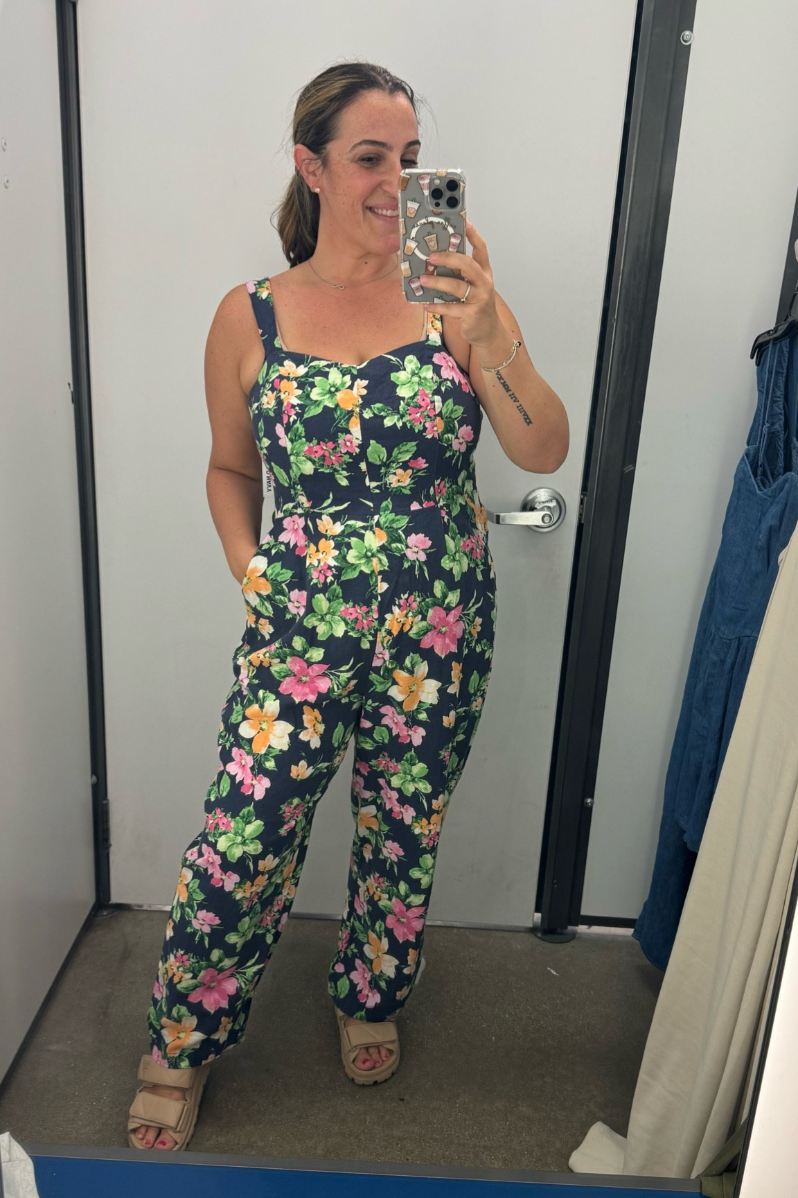 Full jumpsuit! Smocking in the back. Floral is fun for a vacation but a solid would be better. Wearing size large.

#LTKover40 #LTKmidsize #LTKstyletip