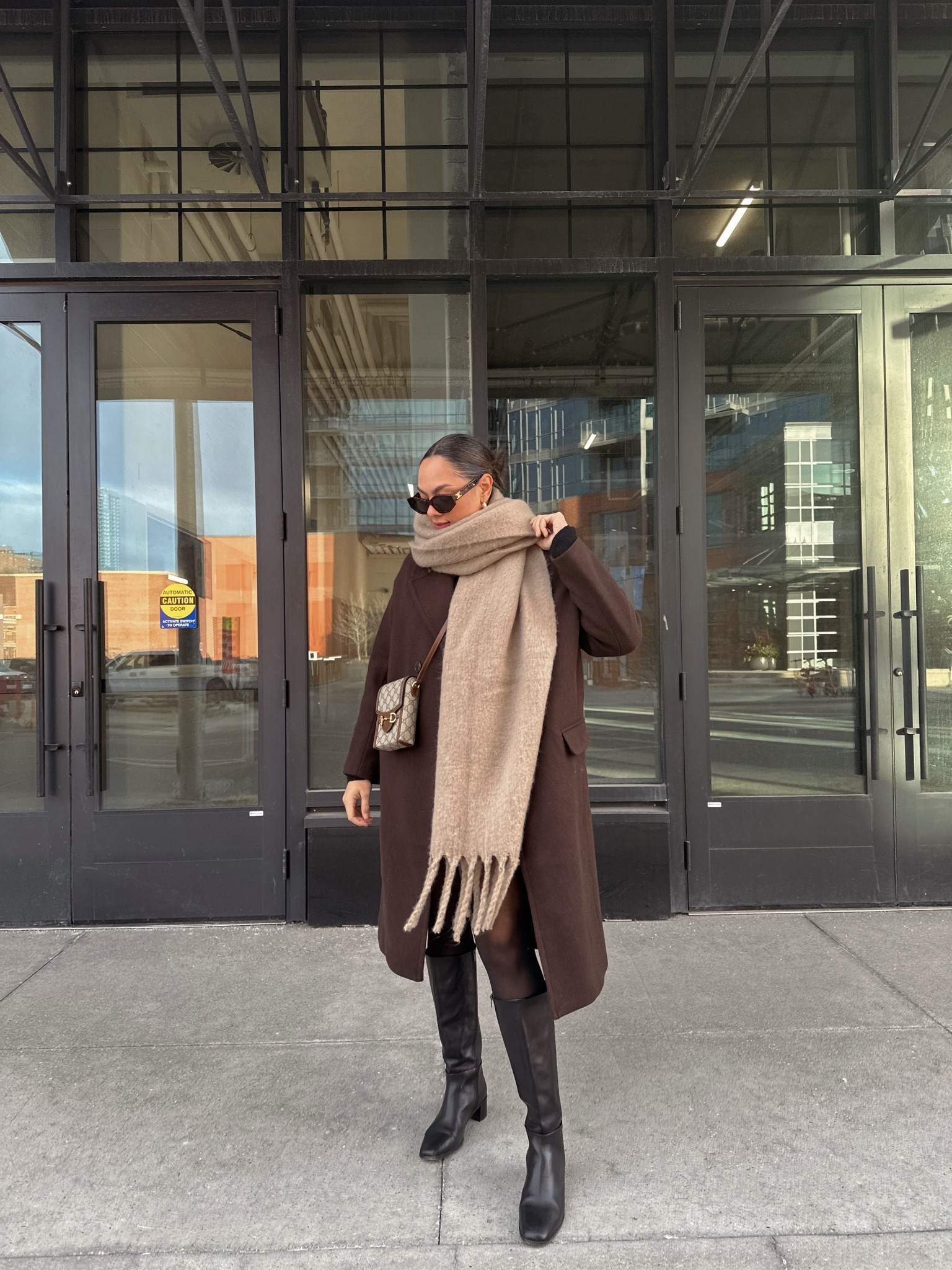 Winter outfit inspiration! Details below:
-Madewell brown wool coat, I have a size 8 
-Madewell black leather knee high boots, similar linked 
-Gucci horsebit mini crossbody bag 
-Zara scarf, similar linked 
-Celine sunglasses 
-Abercrombie black Mockneck short sleeved dress, I have a medium 
-Black tights from H&M, I have a large 


#LTKstyletip #LTKSpringSale #LTKSeasonal