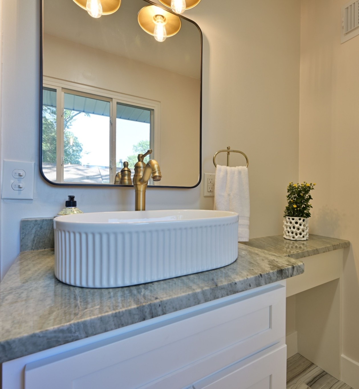 Loving this fluted vessel sink I recently installed in a project house! 
Budget finds, budget friendly!
Another thing I like to do is buy the vanity cabinet (linked) and add counter top. I did that in this bathroom 

#LTKFindsUnder50 #LTKHome #LTKFindsUnder100