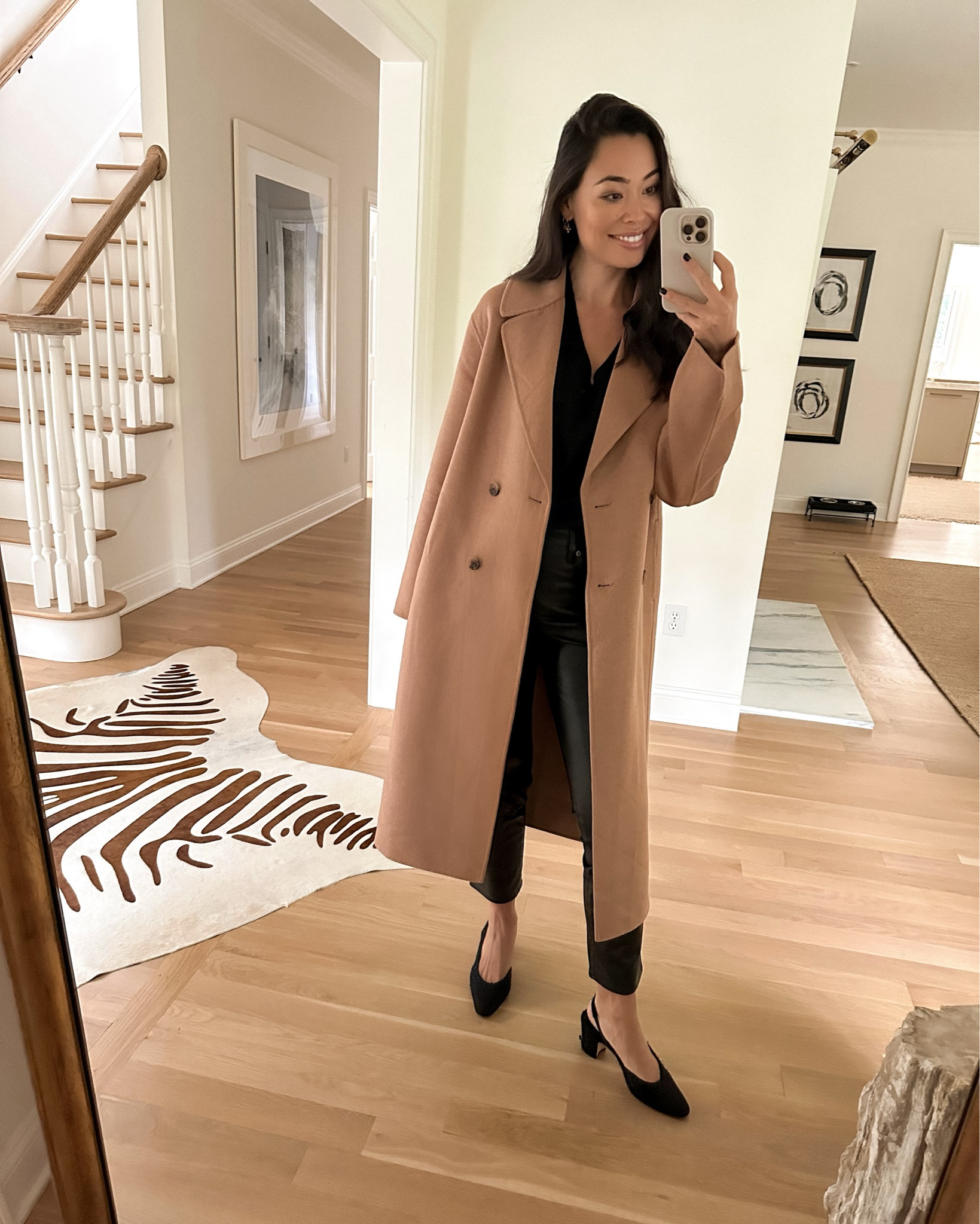 Kat Jamieson wears a camel coat with Chanel sling backs and faux leather pants. 

#LTKworkwear #LTKsalealert #LTKSeasonal