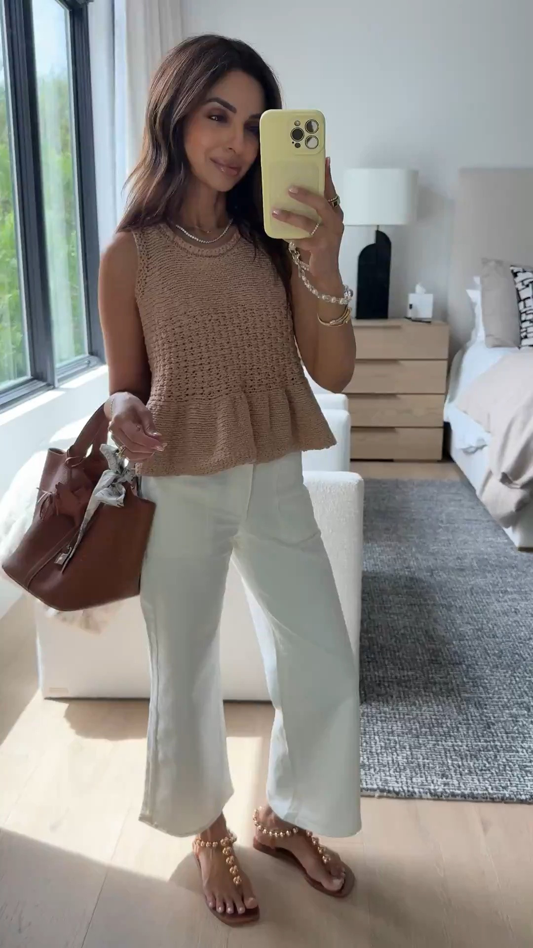 How cute is this knit tank top?! Paired with the most flattering white pants! Summer outfit inspo by @Anthropologie 🤎 I’m wearing size XXS in the top and 24 Petite in the pants!

#LTKootd #LTKSeasonal #LTKOver40