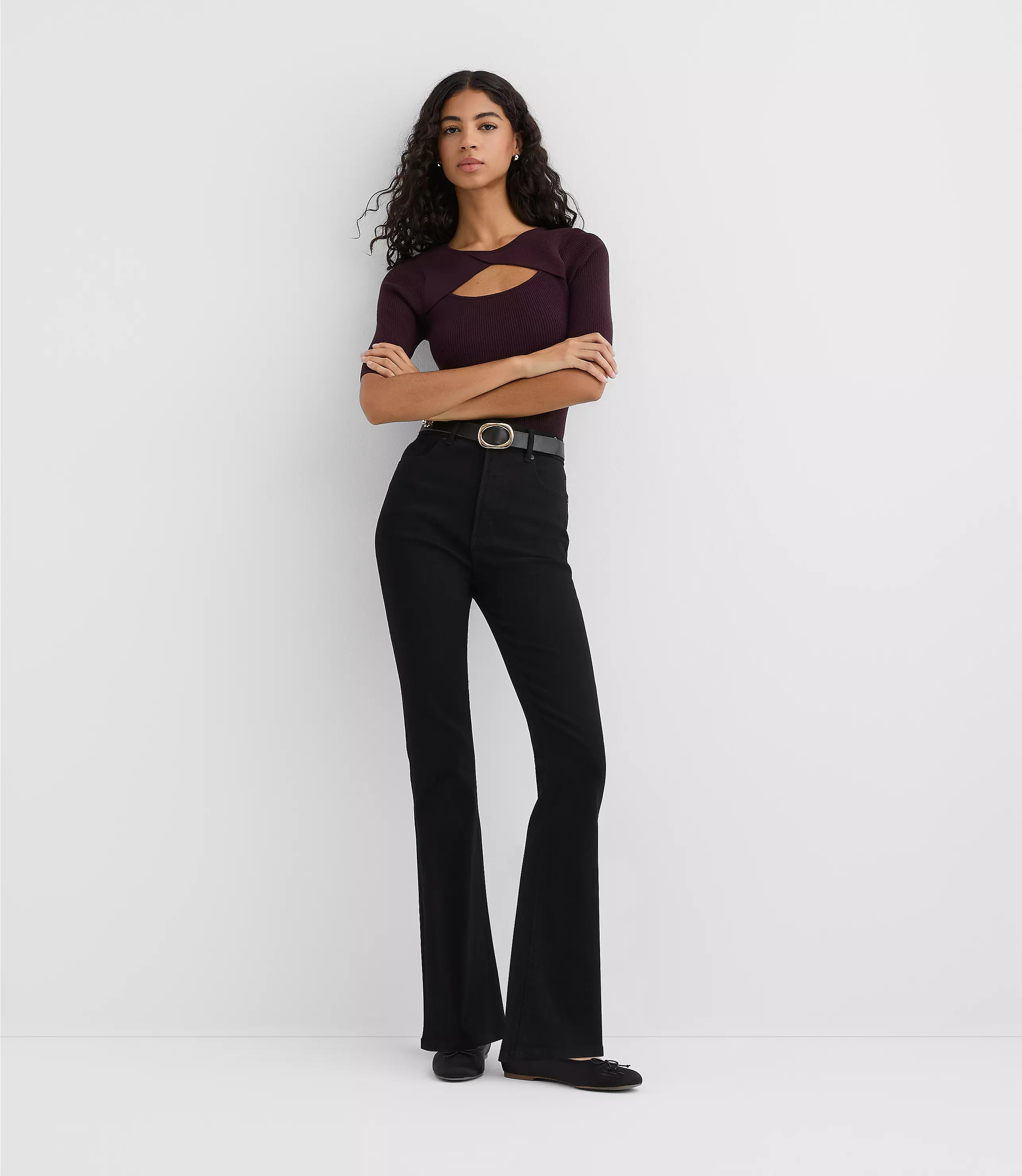 Rivete Petite High Rise Slim Flare Jeans in Noir Wash | LOFT