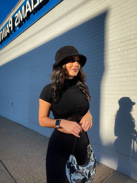 Sunday casual outfit with alo yoga leggings, Dr martens, and a bucket hat. 

All black outfit  

#LTKunder100 #LTKFind #LTKSeasonal