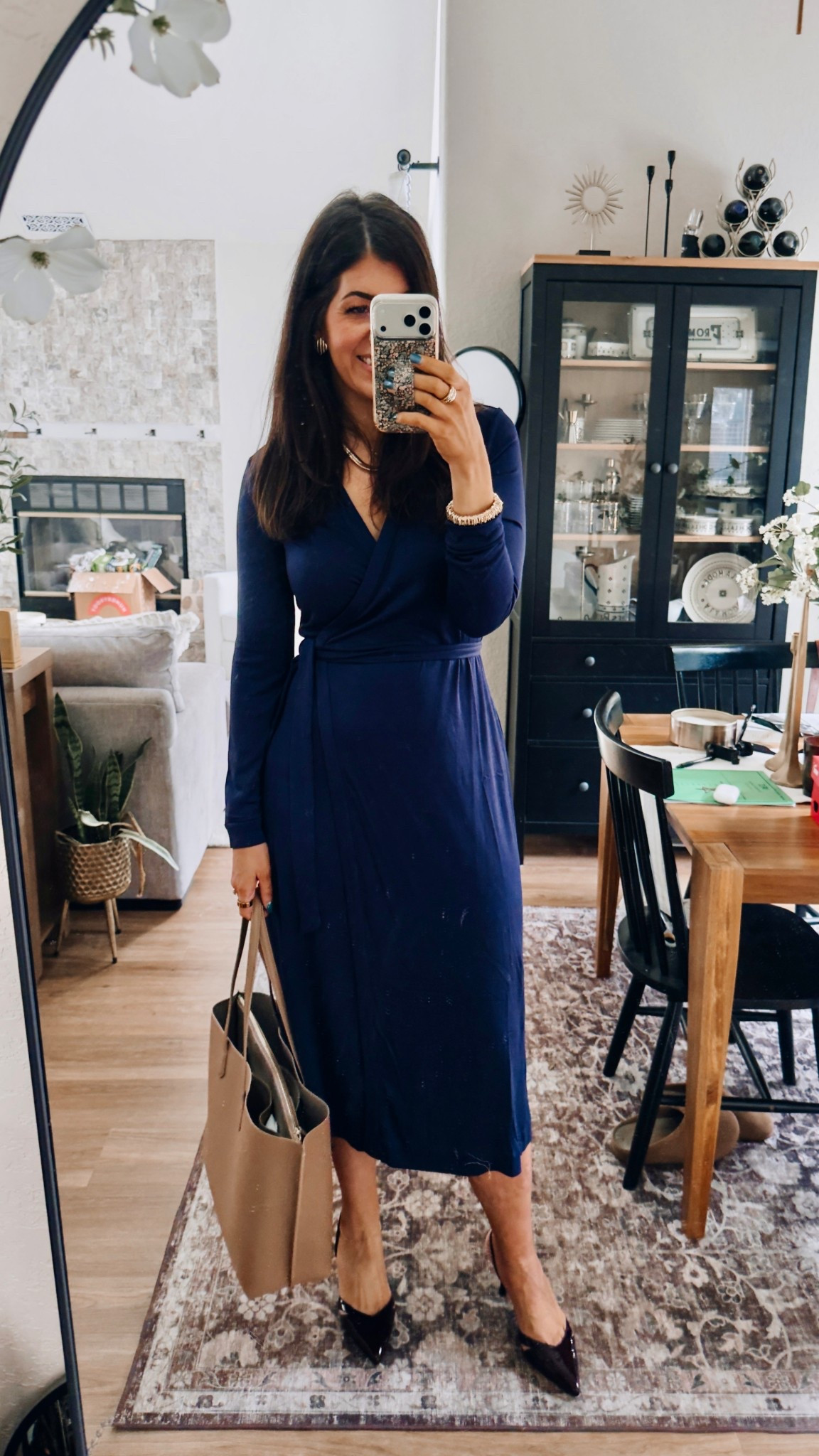 What I wore to work today
In a medium wrap dress 

#LTKTall #LTKWorkwear #LTKMidsize