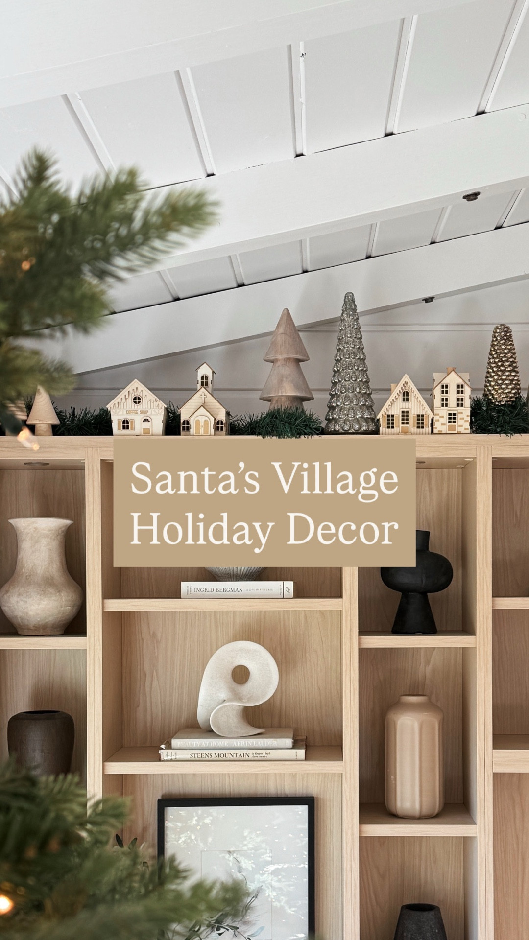Santa’s Village bookshelf Christmas decor! Putting these tiny houses up and creating a miniature winter village is my fave part of decorating for the holidays! The houses are about $5 apiece, and they can be painted to customize any color scheme. They light up too! I added wood trees I’ve collected over the years, as well as garland for some greenery. My daughter LOVES them, and I do too! #christmasdecor #holidaydecor #neutralhome 

#LTKHoliday #LTKHome #LTKFindsUnder50