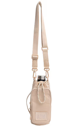 The Water Bottle Sling in Beige | Revolve Clothing (Global)