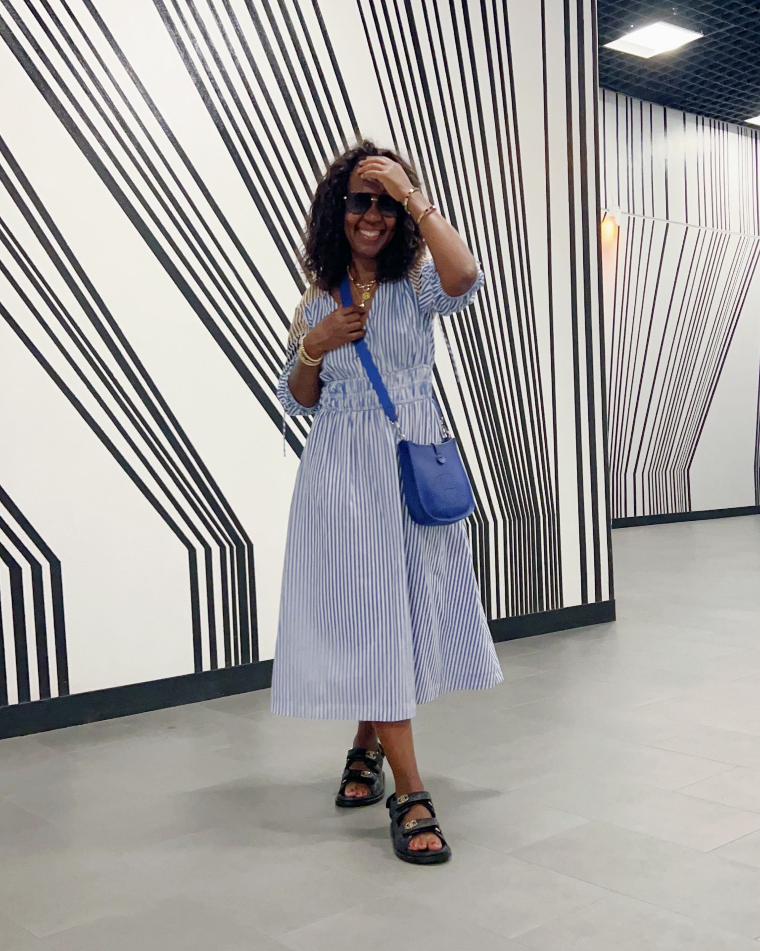 My ideal travel dress. I saw this in the window on Michigan Avenue when I was in Chicago a few months ago and knew it would be perfect for Summer travel. It’s under $45! I’m wearing a size S. Fits TTS.

#LTKTravel #LTKOver40 #LTKFindsUnder50