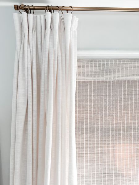 Love these viral Amazon Drapes!!

Perfect window treatment combination for our master bedroom refresh. 

Pinch pleat drapes, room darkening drapes, room darkening shade, woven Roman shade with liner, blackout window shade, woven window shade, faux linen pinch pleat curtains, end cap curtain rod, gold curtain rod, curtain clip rings, drapery rings. 

Neutral decor. 
#bedroom #curtains #amazon

#LTKhome #LTKstyletip #LTKFind