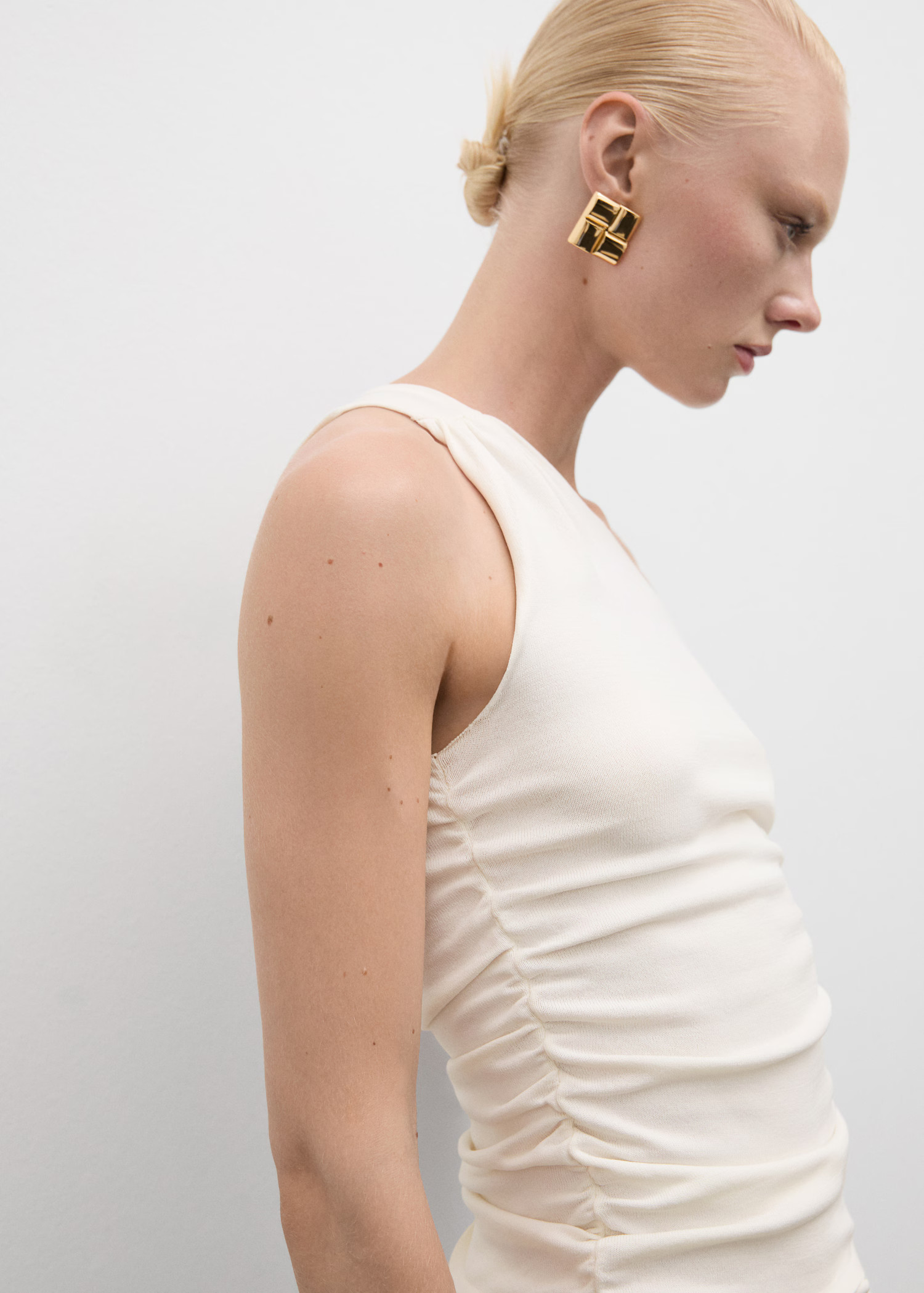 Asymmetric design top - Woman | MANGO USA | MANGO (US)