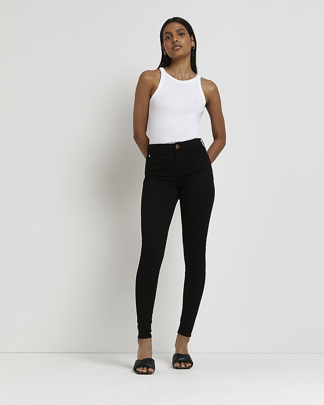 Black Molly mid rise skinny jeans | River Island (UK & IE)