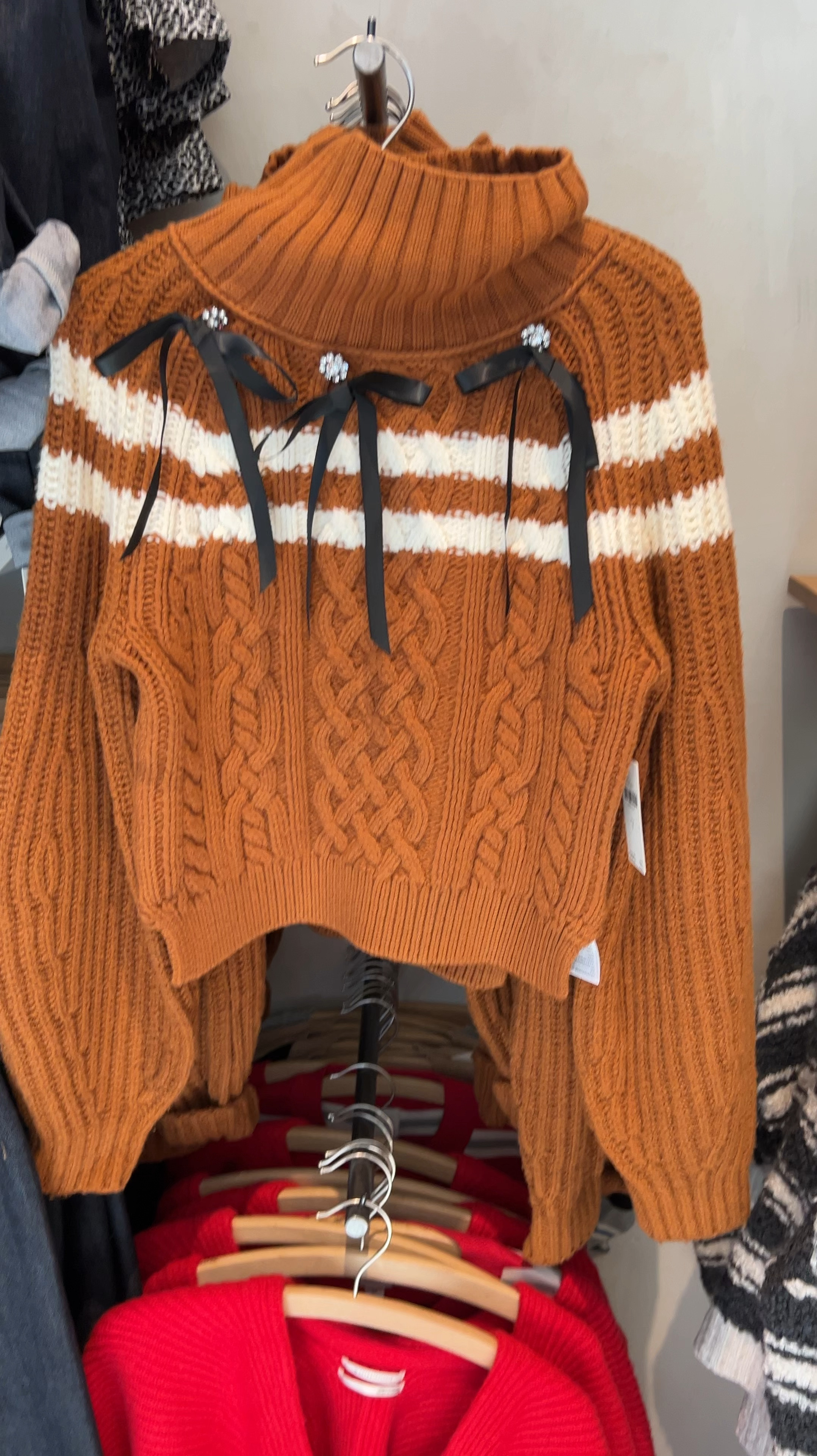 Cute for Thanksgiving outfit 🍁🍂

Bow detail Turtleneck balloon sleeve bow sweater in honey 

Black bows with rhinestone buttons!
Two white stripes 

Cropped but long enough with high waisted jeans ! 

Fits tts 
Online it looks brown but it is a true honey color like my video 

So cute with black trousers or jeans 
And a loafer or bootie for Fall 🍂 Or Thanksgiving outfit🦃



#LTKStyleTip #LTKVideo