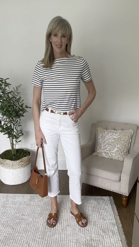 A classic style for Spring.  White cropped denim paired with this striped tee with gold button detail. 

Wearing a size medium in top, size 6 in jeans.  

#LTKFindsUnder50 #LTKStyleTip #LTKOver40