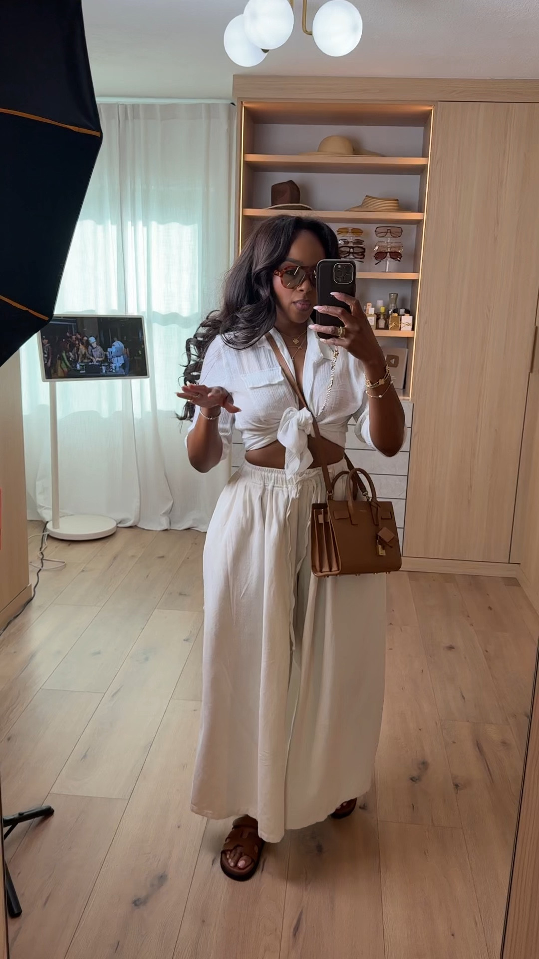 Scroll to shop this effortless summer neutral set ☀️

This flowy wide-leg pant paired with a tie-front top gives that relaxed but elevated vibe you can wear on repeat. Lightweight pieces like this are a long-term win because you can style them so many ways, bringing the cost per wear way down.

Perfect for vacation, brunch, beach dinners, and casual days out.

📏 Measurements: 5’4”, 140 lbs, 34D bust, 27” waist, 40” hips

Follow me on Instagram and YouTube @kirasfashionfinds