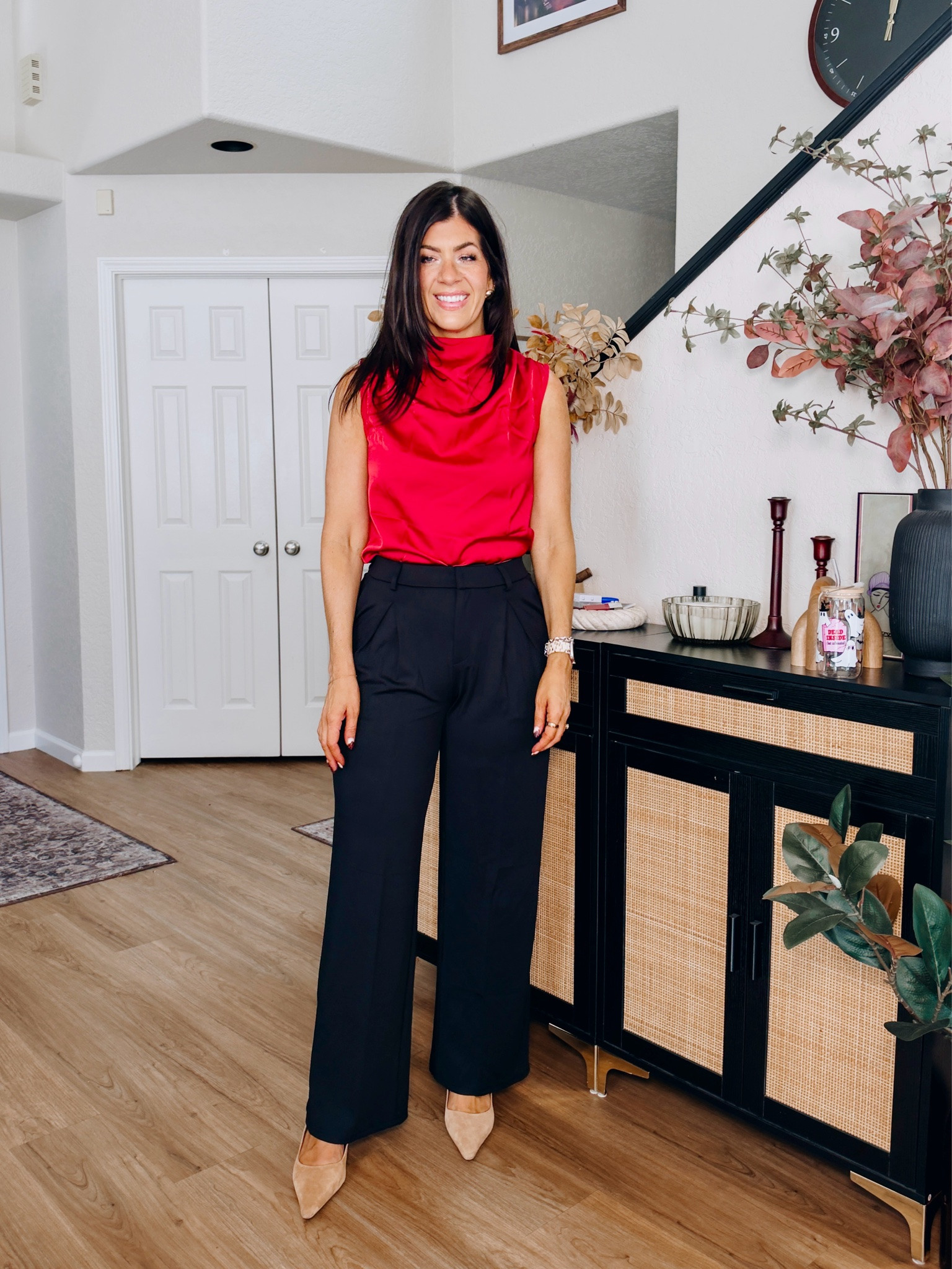 Workwear under $50
In a medium satin top and large long pants