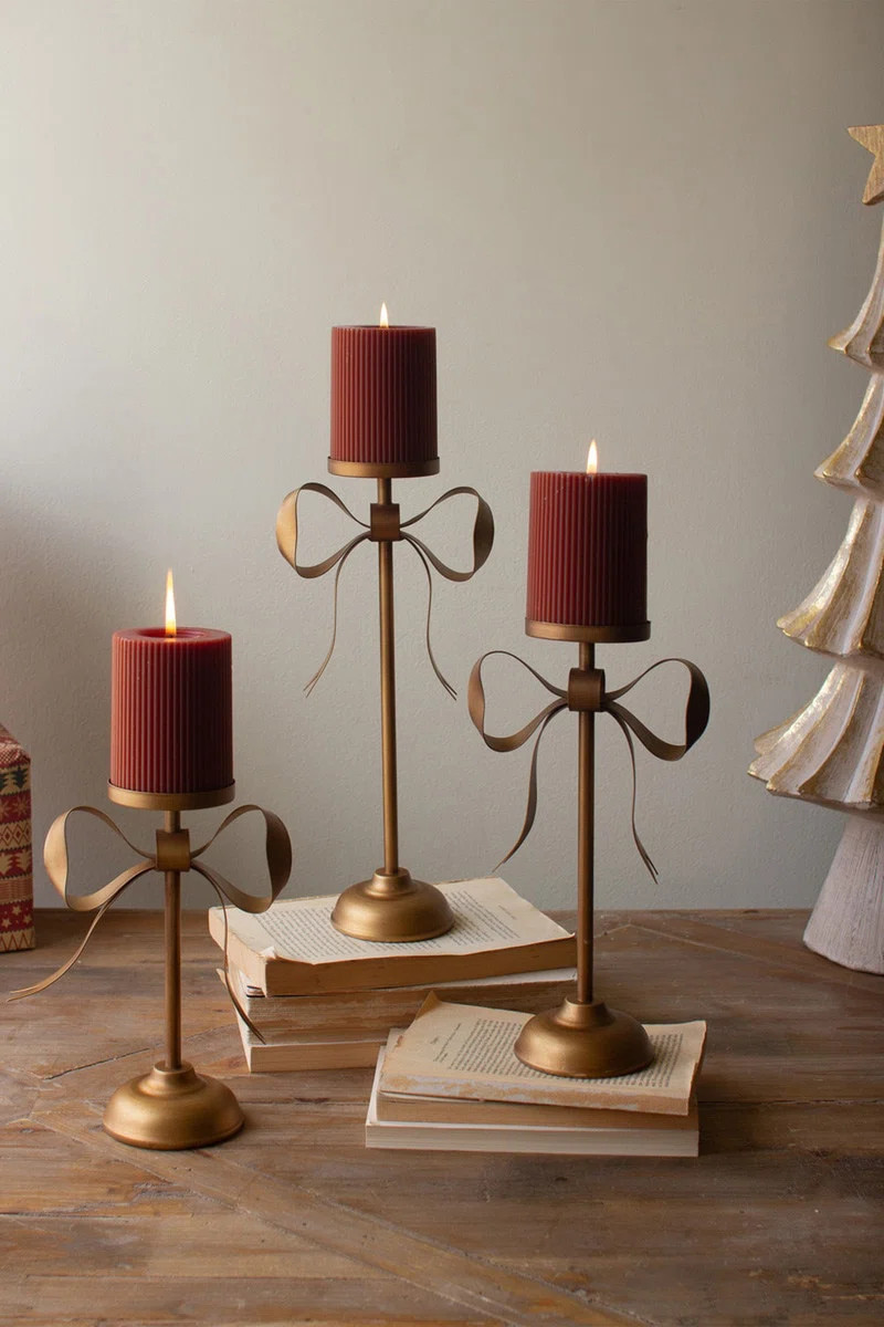 SET OF THREE ANTIQUE BRASS PILLAR CANDLE STANDS -BOW DETAIL | Wayfair North America