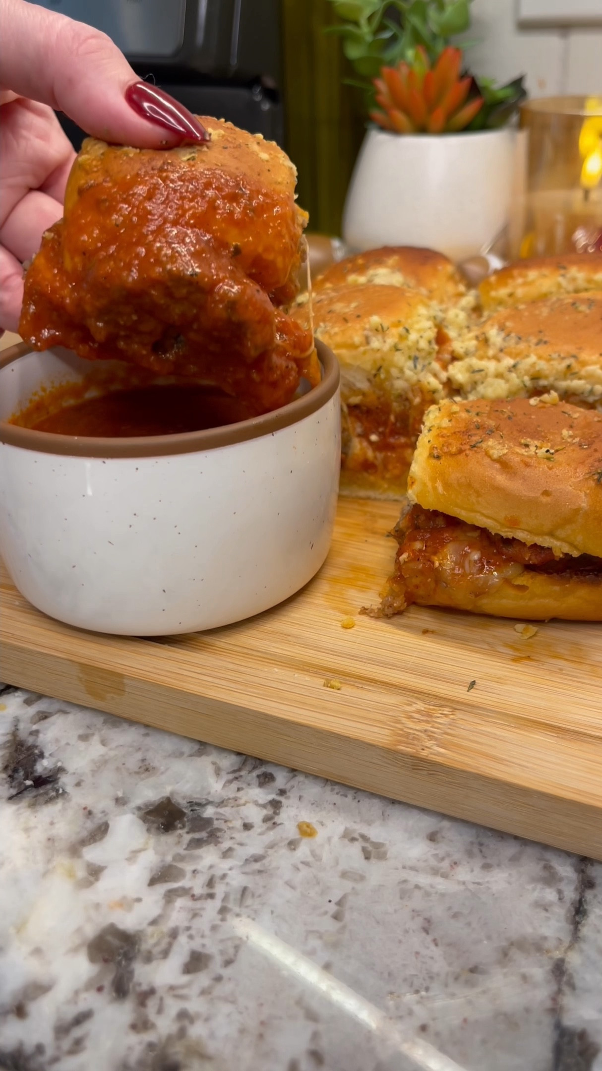 nothing hits the spot quite like a homemade meatball sub🤌✨make them sliders on hawaiian rolls & you’ve got an absolute 10/10  perfect for a Super Bowl game day party! linked all my favorite products so you can make it too🏈  Ingredients: - 1 lb lean ground beef - 1 lb mild italian sausage - 2 eggs - 1/2 cup panko breadcrumbs - 1 shallot, diced finely - 5-6 cloves garlic, minced - fresh parsley, chopped - 1 tsp italian seasoning - 2 tsp salt, 2 tsp pepper - 1/3 cup grated parmesan cheese *mix ingredients and form into small balls- yields about 50 meatballs. half or double recipe if need be - 1 jar pasta sauce - 1 15oz can tomato sauce - 1 tsp italian seasoning - 1 tsp garlic powder - 1 tsp onion powder - 1 tsp salt & pepper (to taste) *cover and simmer on low for 30 minutes - hawaiian rolls - 3 tbsp butter, melted - 1/2 tsp italian seasoning - 1/2 tbsp minced garlic - 1/4 cup grated parmesan cheese *spread on bottom & broil for 2-3 minutes until brown, add fillings & spread on top then bake for 7-10 minutes at 350°F until golden brown  

#LTKParties #LTKHome #LTKFamily
