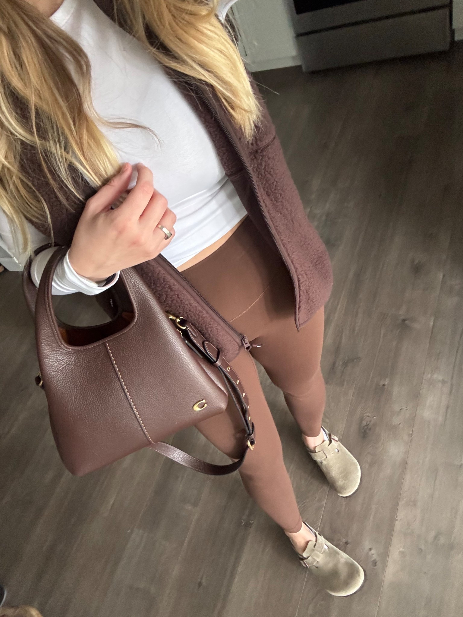 outfit of the day for running errands 

fall outfit inspo | athleisure | lululemon | aritzia fleece vest | coach bag | Lana 23 maple | Birkenstock Boston’s | birks 

#LTKStyleTip #LTKActive #LTKSeasonal