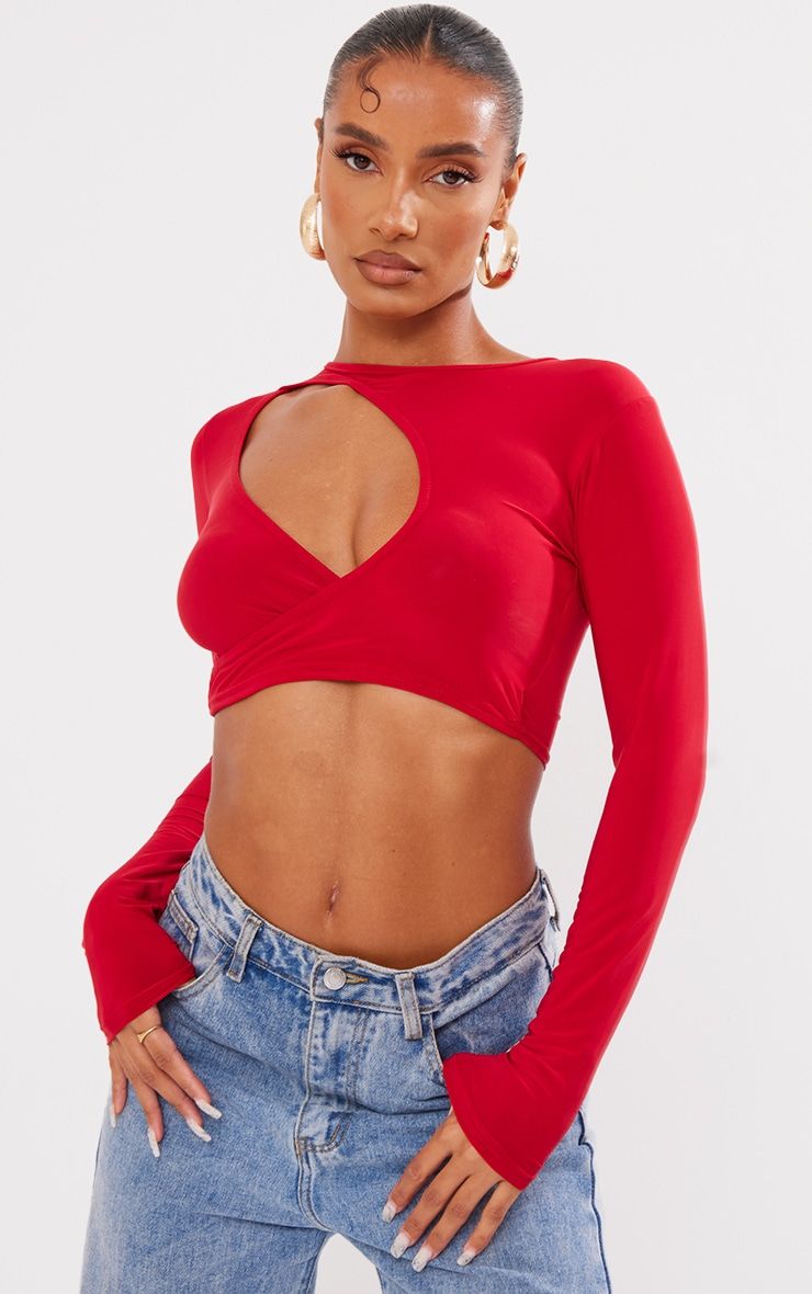 Red Slinky Cut Out Wrap Long Sleeve Crop Top | PrettyLittleThing US