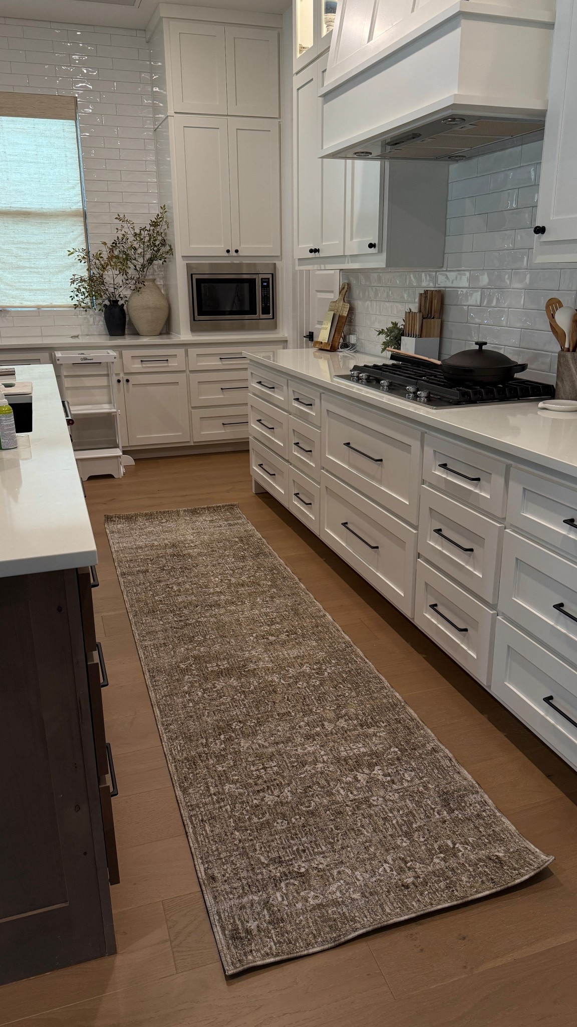 new runner in the kitchen! same rug we have in the living room  