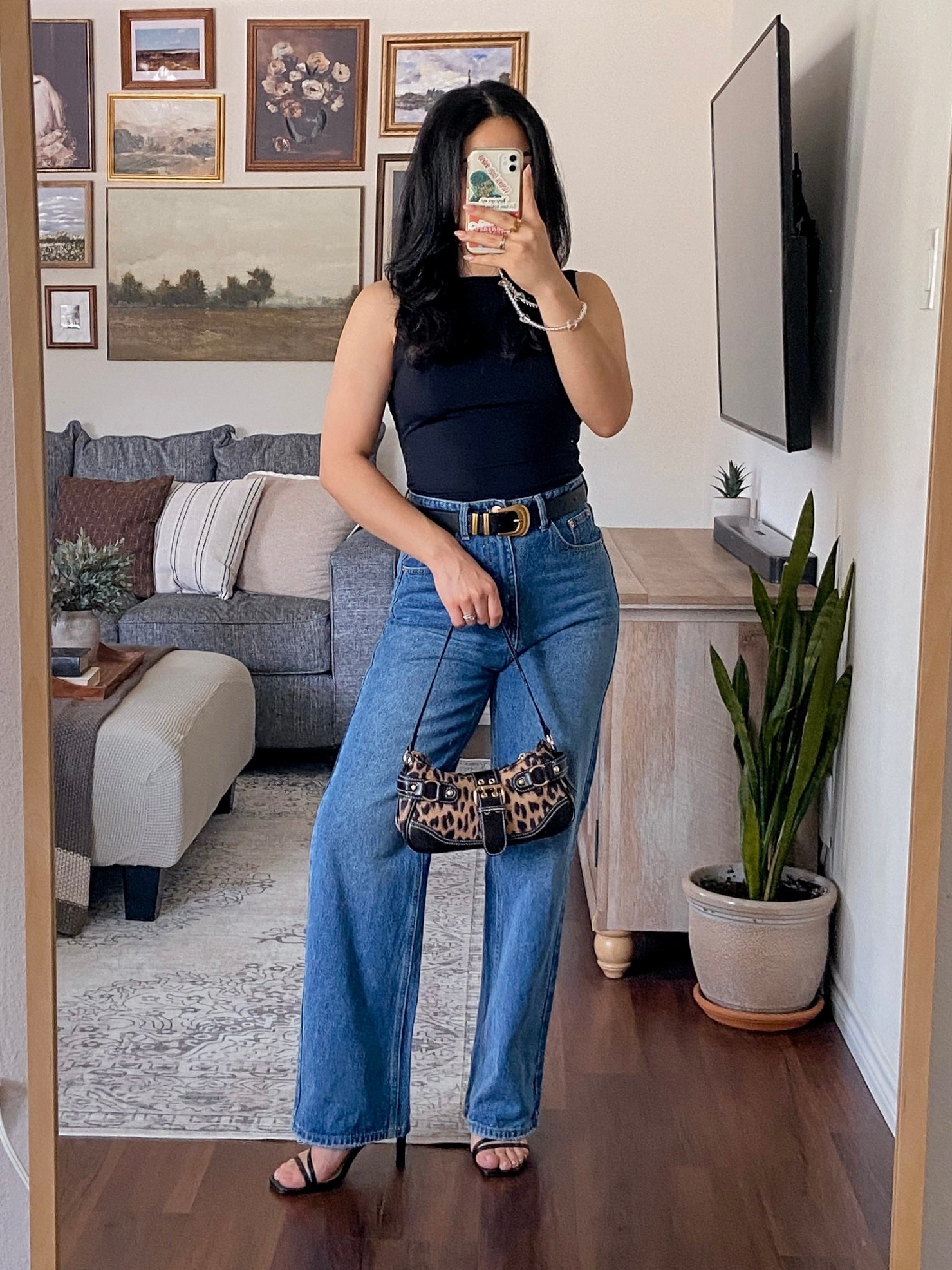 outfit of the day inspo 🐆♠️ i’m wearing this top in a size large and it fits like a medium. wearing these jeans in a size medium and they fit true to size. kept this outfit minimal with a black belt and heels but added a subtle pop with this animal print purse. 

🏷️: amazon fashion find, casual chic style, minimal style, chic outfit, amazon style, outfit ideas for you, 2025 outfit ideas, 

#LTKFindsUnder50 #LTKSeasonal #LTKActive
