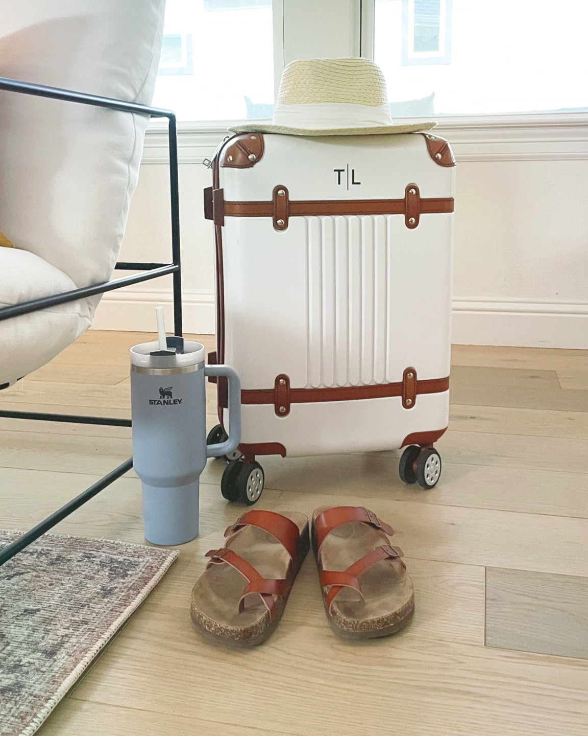 Travel essentials: chic, durable monogrammed luggage, comfy shoes, Stanley, and hat. Ready to roll!

#LTKtravel