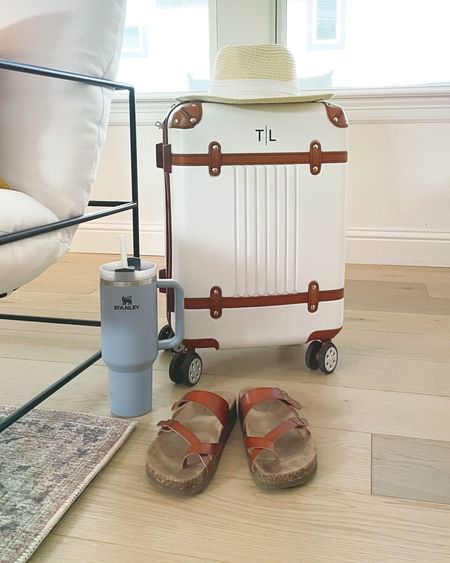 Travel essentials: chic, durable monogrammed luggage, comfy shoes, Stanley, and hat. Ready to roll!

#LTKtravel