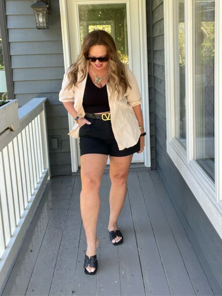 Perfect gauze short sleeve shirt for Summer Days☀️I paired them with my favorite black dressy linen shorts and my designer inspired sandals price in the twenties. 

#LTKSeasonal #LTKfindsunder50 #LTKtravel