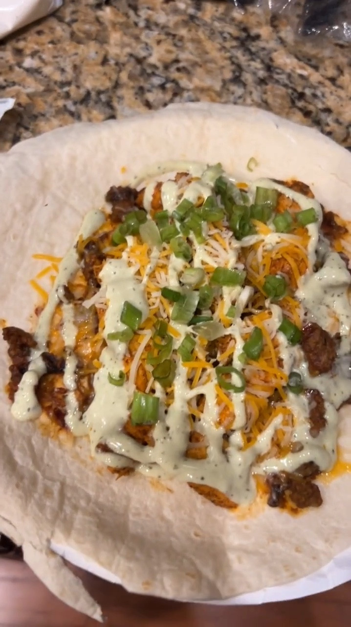 Spicy Pulled Pork and Green Pepper Wrap Ingredients: (10/10) 😍❤️
- 1 Green Pepper
- 1 teaspoon Hot Sauce
- 1 tablespoon Fajita Spice Blend
- 1/2 cup Cheddar Cheese 
- 4 tablespoons Yogurt
- 8 ounces Pulled Pork
- 2 Flour Tortillas 
- ChikfilA Avocado Lime Ranch Dressing
- 1 Scallions Stem (Garnish) 

Try it and let me know how it went. Great for parties or a quick lunch. 

#LTKparties #LTKVideo #LTKfamily