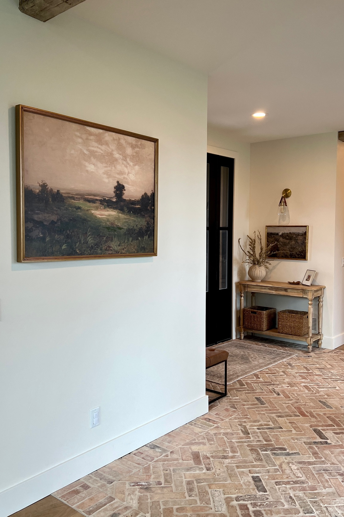 Foyer / entryway vibes with antique art print.

Antique framed art
Vintage framed painting 
Foyer design
Entryway design
Console table
Entryway table
Olive stems
Brick floor
Black front door
Entryway bench
Entryway baskets


#LTKHome