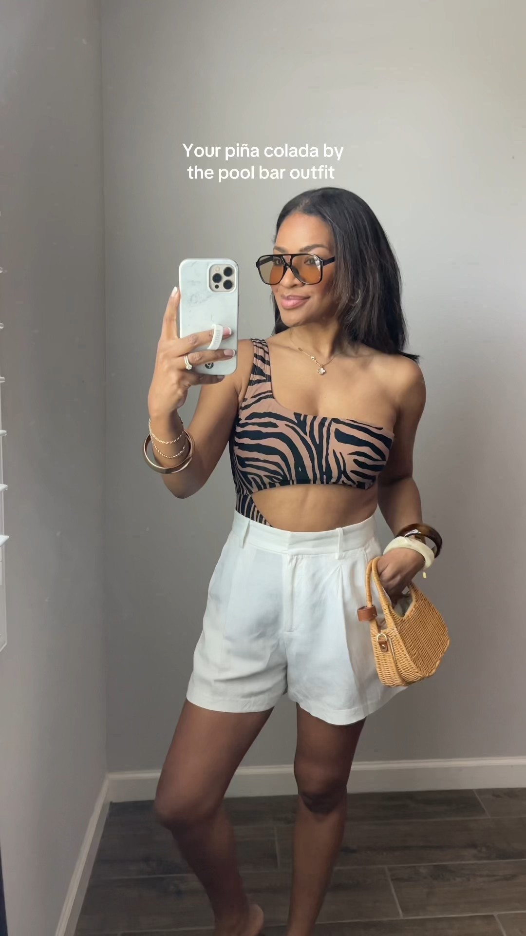 Loveee this one piece. It’s so flattering! Wearing a small. Shorts are also a size small 

 #ltkfindsunder50 #ltkfindsunder100 #ltkswim