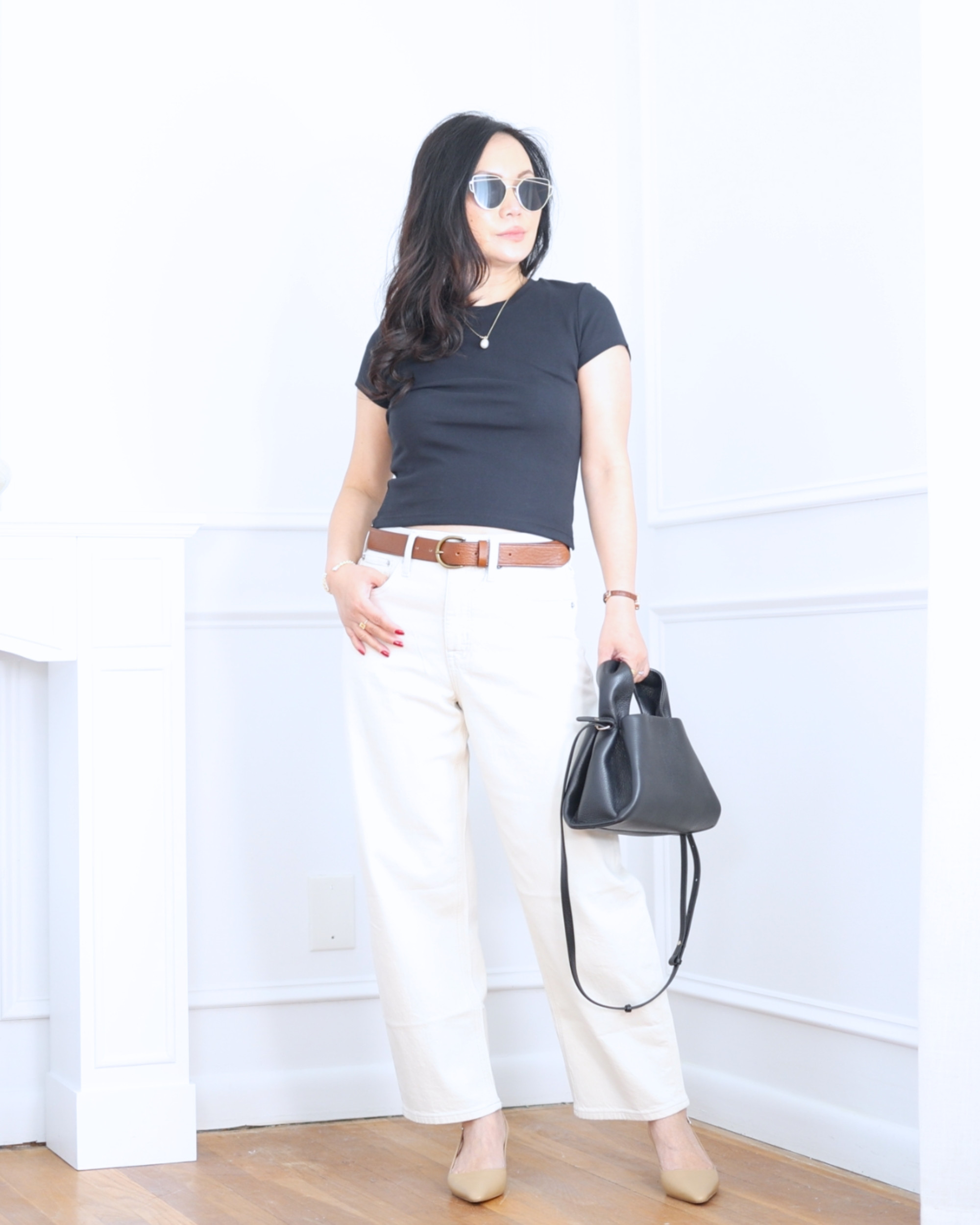 Black tee from Uniqlo paired with barrel jeans from J.Crew Factory and slingback pumps — simple, modern, and effortlessly polished for everyday wear. I'm 5'2, wearing size XS. 

 #LTKootd #LTKOver40 #LTKPetite