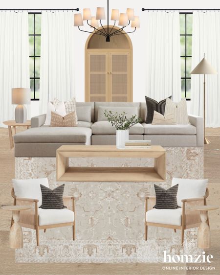 Warm organic modern living room design with sectional. Were loving the arched cabinet and neutral coffee table  

#LTKhome #LTKfamily #LTKfindsunder100