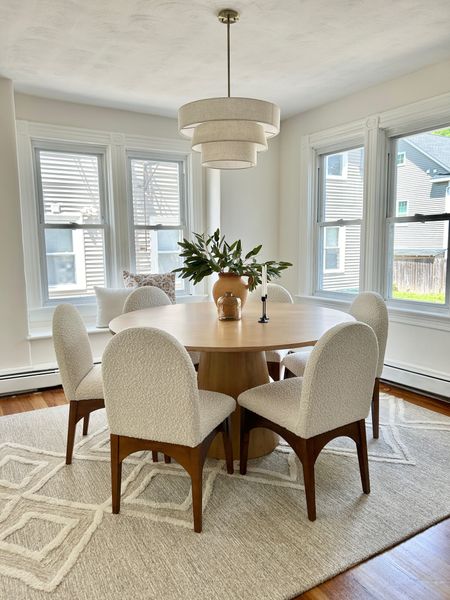 Beautiful 60inch round dining table with cream boucle chairs. 

#diningroom #diningchairs

#LTKHome