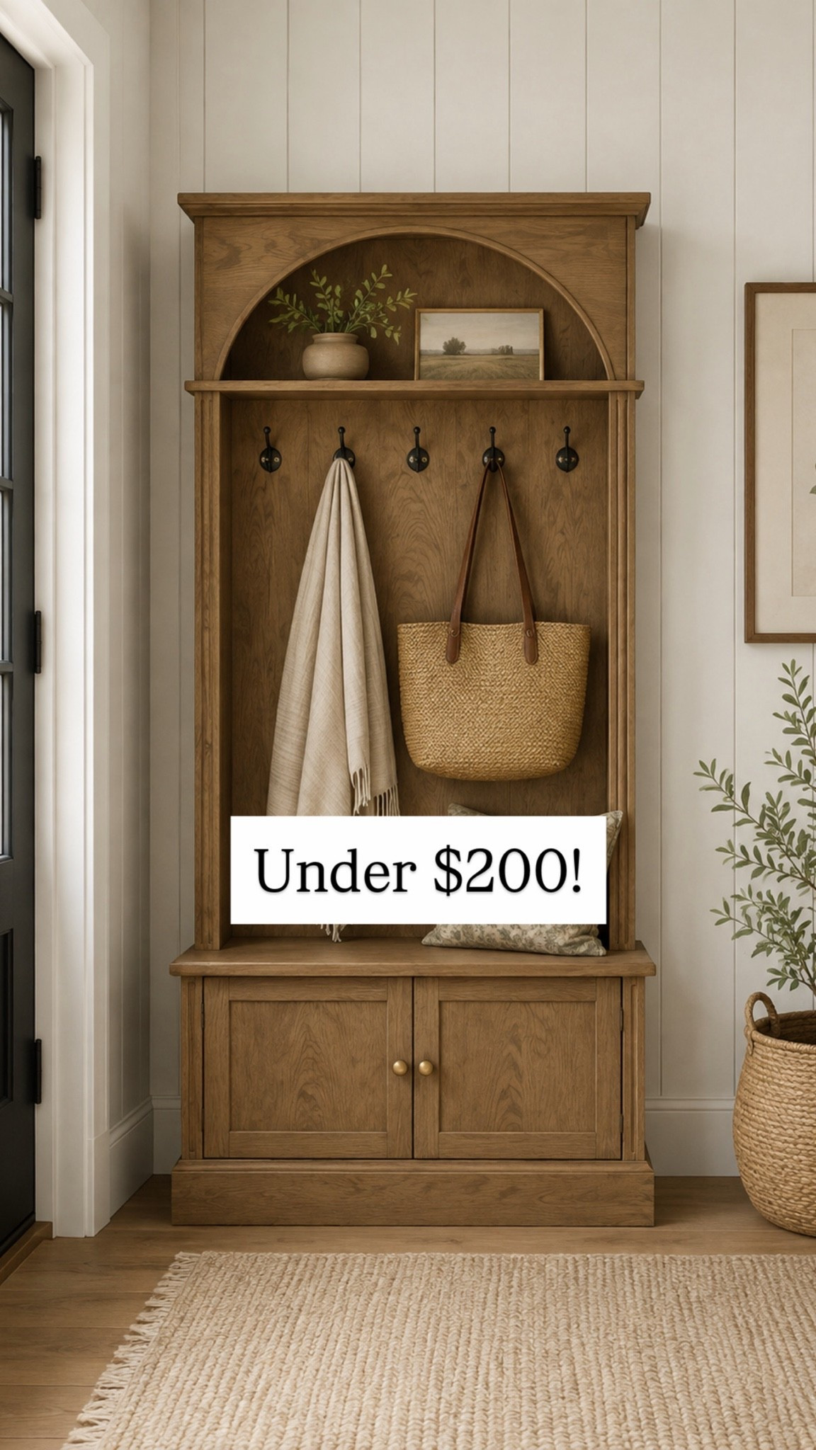 This hall tree is such a pretty way to add storage and charm to an entryway 🤎 I love the warm wood, arched detail, and built-in hooks and cabinets. It would be perfect for keeping everyday bags, shoes, blankets, and all those little entryway essentials tucked away while still looking beautiful!

#LTKHome #LTKSaleAlert