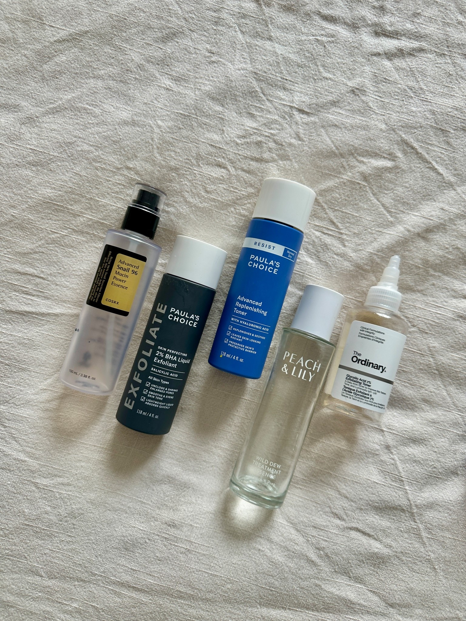 My favorite toners and essences! 🧖🏽‍♀️🤍 

both the cosrx and peach and lily essences are wonderful for hydration, with the peach and lily being best for skin prep for makeup. 

paula's choice (blue bottle) is best for hydration, while the (grey bottle) is best for resurfacing textured skin and exfoliating with active ingridients. 

ordinary's glycolic acid toner is wonderful for skin and body. works amazing for textured and melanated skin! 

#LTKBeauty