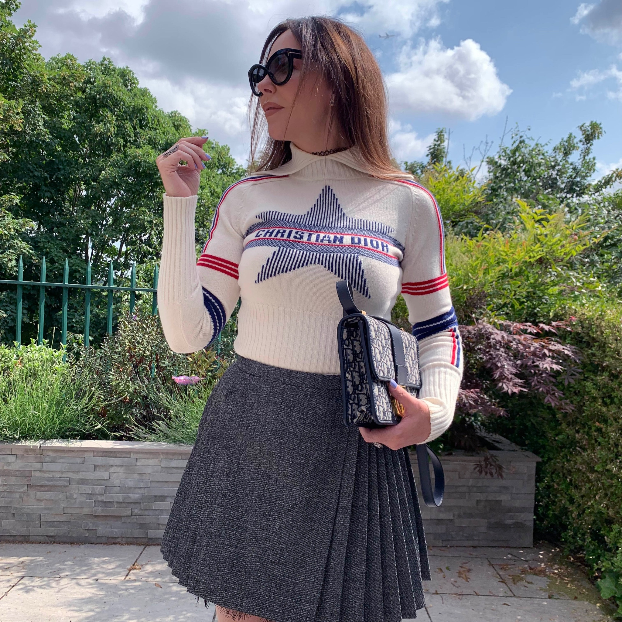 Cream beige Long sleeve, turtleneck top, pleated skirt, black crossbody bag 

#LTKstyletip #LTKeurope #LTKSeasonal